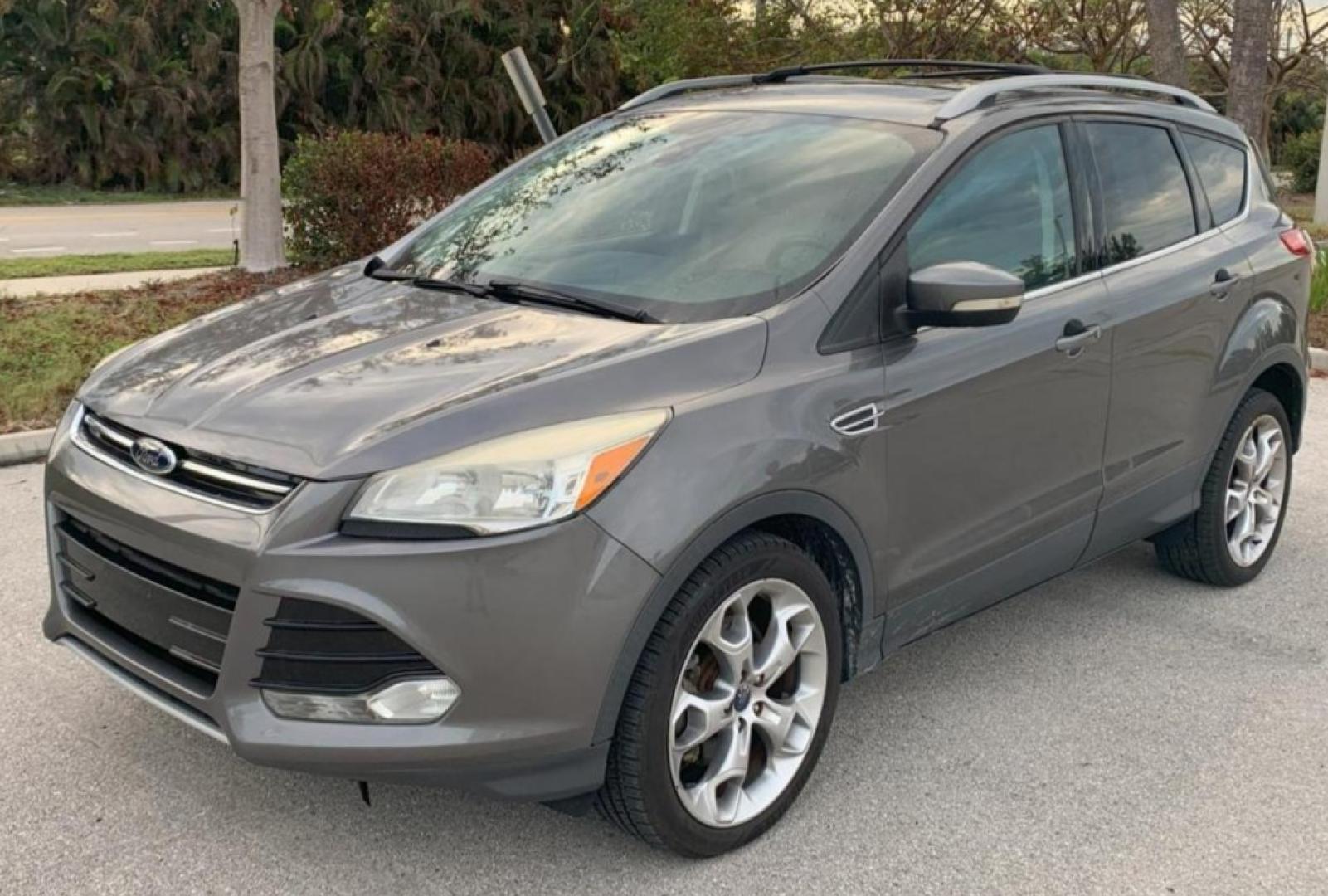 2014 GREY /Medium Light Stone FORD ESCAPE TITANIUM (1FMCU9J95EU) with an 2.0L engine, Automatic transmission, located at 11170 Summerlin Square Dr., Fort Myers Beach, FL, 33931, (239) 999-7777, 26.493546, -81.941628 - 37 Service History Records Carfax - Photo#0