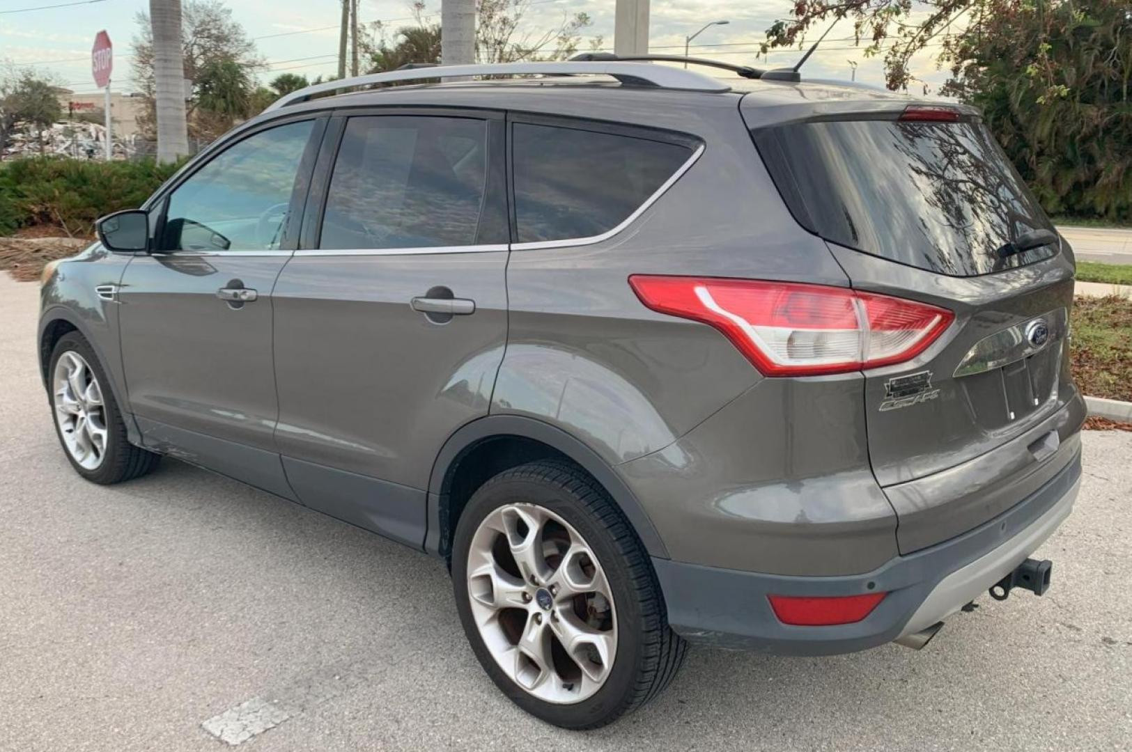 2014 GREY /Medium Light Stone FORD ESCAPE TITANIUM (1FMCU9J95EU) with an 2.0L engine, Automatic transmission, located at 11170 Summerlin Square Dr., Fort Myers Beach, FL, 33931, (239) 999-7777, 26.493546, -81.941628 - 37 Service History Records Carfax - Photo#4