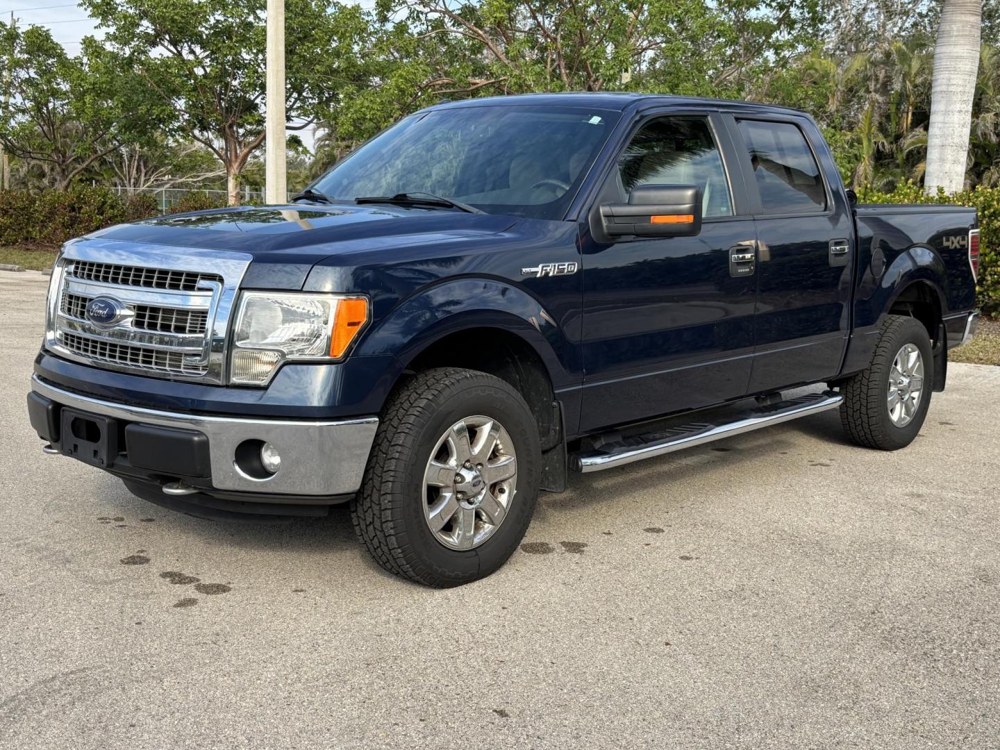 2013 BLUE /Tan Cloth FORD F150 SUPERCREW (1FTFW1EF0DK) with an 5.0L engine, Automatic transmission, located at 11170 Summerlin Square Dr., Fort Myers Beach, FL, 33931, (239) 999-7777, 26.493546, -81.941628 - Photo#0