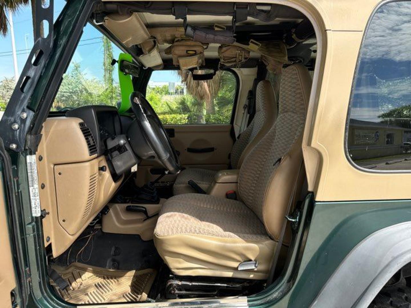 1999 Forest Green Pearlcoat /Agate Vinyl Jeep Wrangler Sport (1J4FY19S5XP) with an 4.0L L6 OHV 12V engine, located at 11170 Summerlin Square Dr., Fort Myers Beach, FL, 33931, (239) 999-7777, 26.493546, -81.941628 - Photo#13