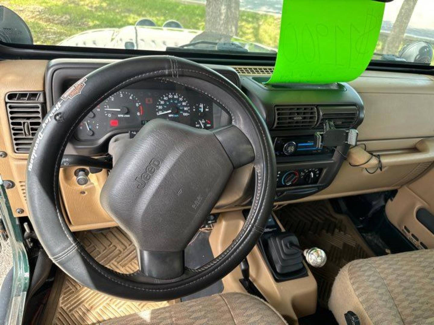 1999 Forest Green Pearlcoat /Agate Vinyl Jeep Wrangler Sport (1J4FY19S5XP) with an 4.0L L6 OHV 12V engine, located at 11170 Summerlin Square Dr., Fort Myers Beach, FL, 33931, (239) 999-7777, 26.493546, -81.941628 - Photo#23