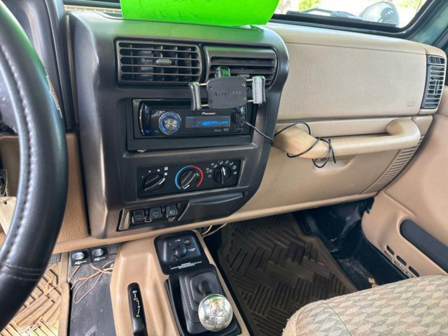 1999 Forest Green Pearlcoat /Agate Vinyl Jeep Wrangler Sport (1J4FY19S5XP) with an 4.0L L6 OHV 12V engine, located at 11170 Summerlin Square Dr., Fort Myers Beach, FL, 33931, (239) 999-7777, 26.493546, -81.941628 - Photo#25