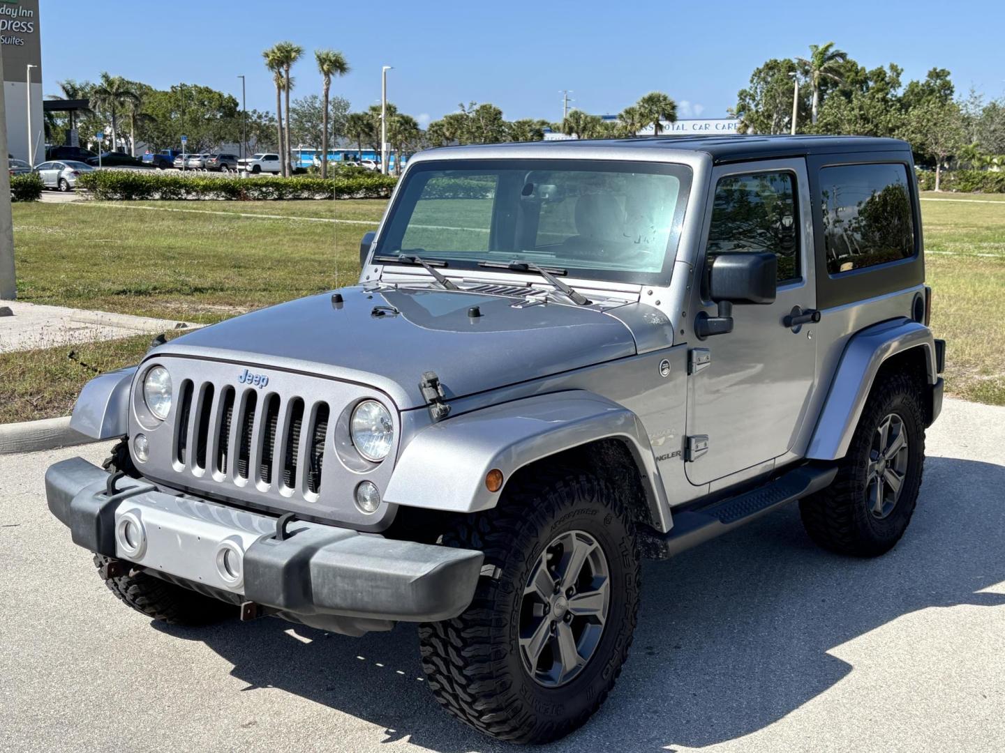 2015 SILVER /Black JEEP WRANGLER SAHARA (1C4AJWBG8FL) with an 3.6L engine, Automatic transmission, located at 11170 Summerlin Square Dr., Fort Myers Beach, FL, 33931, (239) 999-7777, 26.493546, -81.941628 - No Damage No Accident Carfax - Photo#0