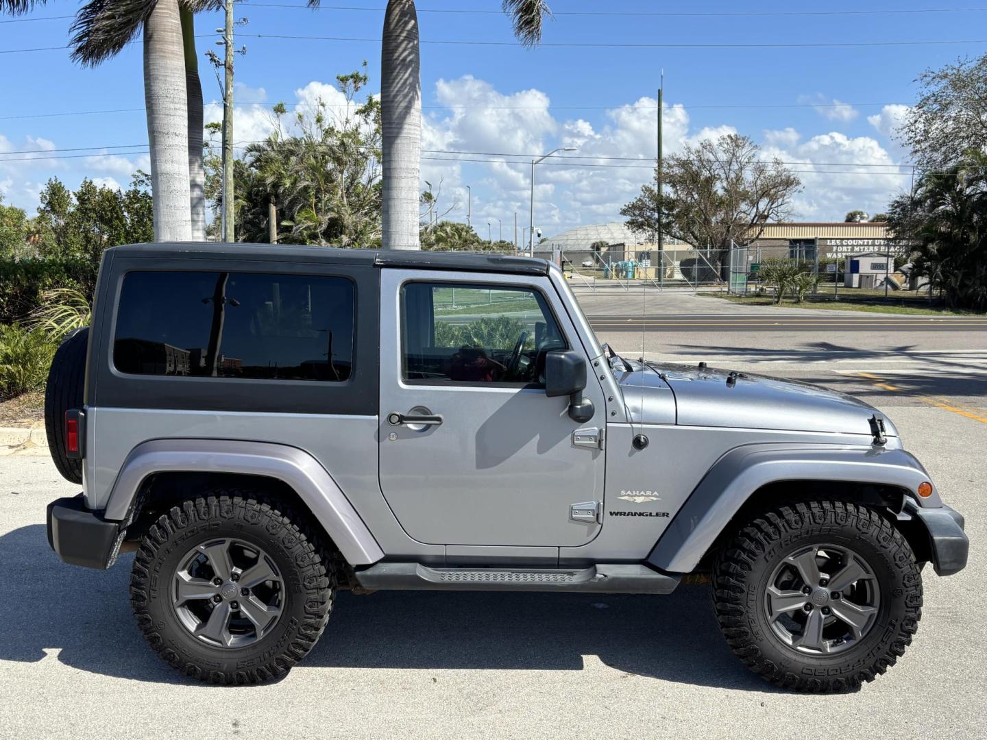 2015 SILVER /Black JEEP WRANGLER SAHARA (1C4AJWBG8FL) with an 3.6L engine, Automatic transmission, located at 11170 Summerlin Square Dr., Fort Myers Beach, FL, 33931, (239) 999-7777, 26.493546, -81.941628 - No Damage No Accident Carfax - Photo#3