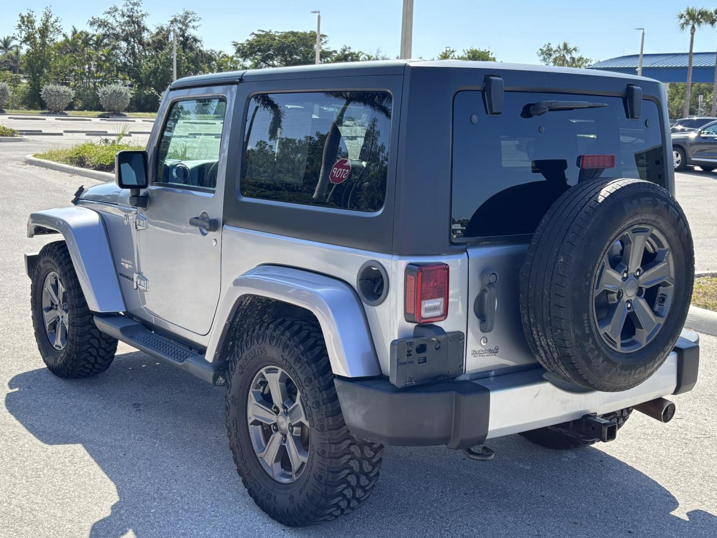 2015 SILVER /Black JEEP WRANGLER SAHARA (1C4AJWBG8FL) with an 3.6L engine, Automatic transmission, located at 11170 Summerlin Square Dr., Fort Myers Beach, FL, 33931, (239) 999-7777, 26.493546, -81.941628 - No Damage No Accident Carfax - Photo#4