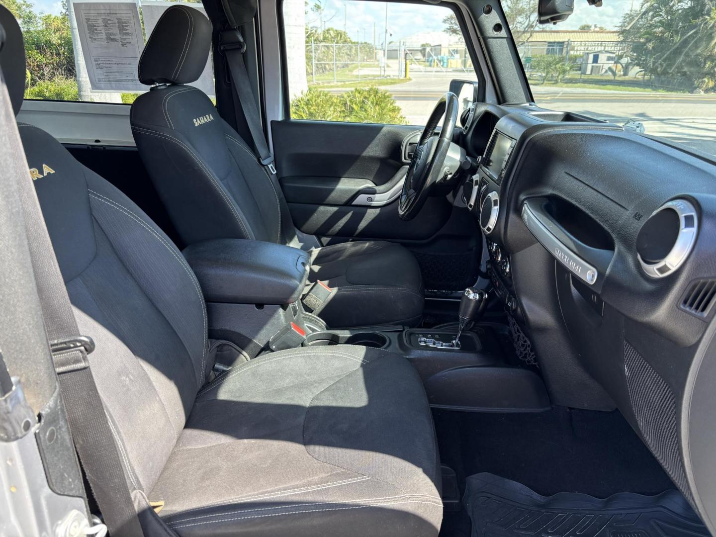 2015 SILVER /Black JEEP WRANGLER SAHARA (1C4AJWBG8FL) with an 3.6L engine, Automatic transmission, located at 11170 Summerlin Square Dr., Fort Myers Beach, FL, 33931, (239) 999-7777, 26.493546, -81.941628 - No Damage No Accident Carfax - Photo#11