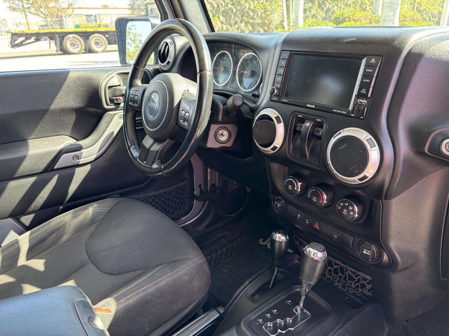 2015 SILVER /Black JEEP WRANGLER SAHARA (1C4AJWBG8FL) with an 3.6L engine, Automatic transmission, located at 11170 Summerlin Square Dr., Fort Myers Beach, FL, 33931, (239) 999-7777, 26.493546, -81.941628 - No Damage No Accident Carfax - Photo#12