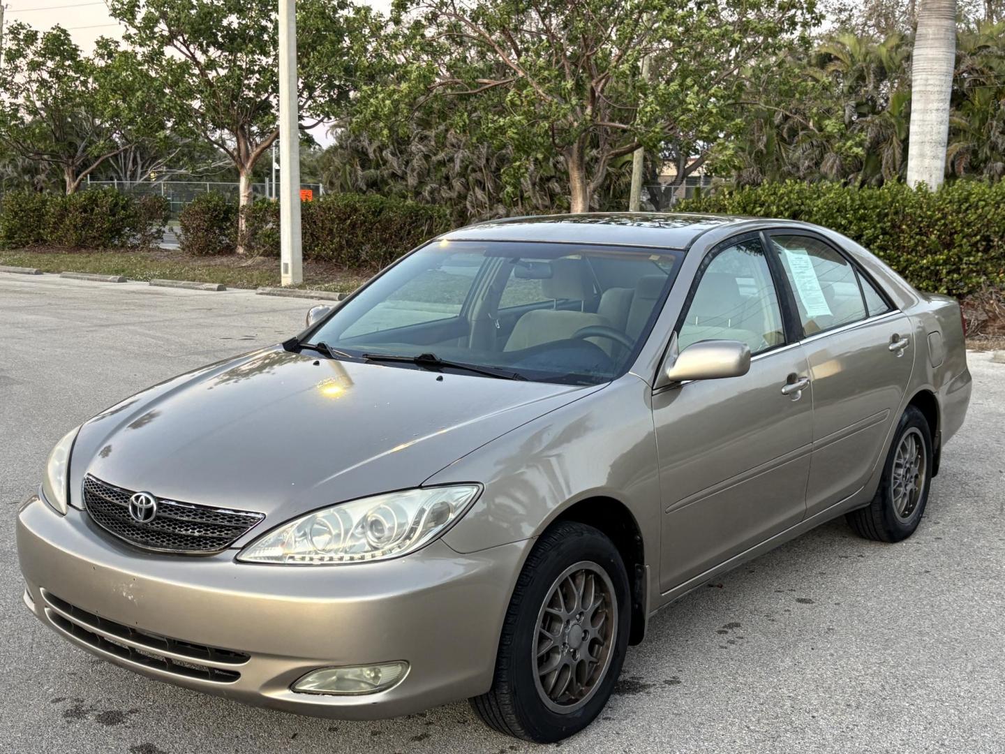 2004 GOLD /Tan Cloth TOYOTA CAMRY SE (4T1BA32K44U) with an 3.3L engine, Automatic transmission, located at 11170 Summerlin Square Dr., Fort Myers Beach, FL, 33931, (239) 999-7777, 26.493546, -81.941628 - Photo#0