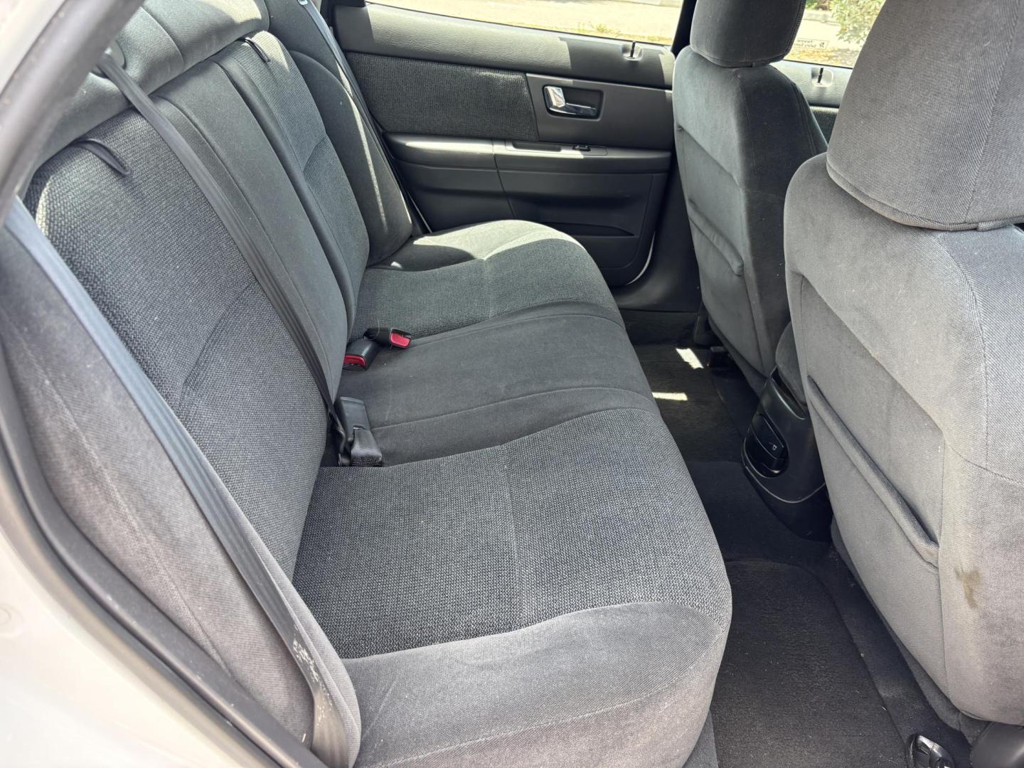 2001 WHITE /CHARCOAL Ford Taurus SE (1FAFP53U51G) with an 3.0L V6 OHV 12V engine, 4-Speed Automatic Overdrive transmission, located at 11170 Summerlin Square Dr., Fort Myers Beach, FL, 33931, (239) 999-7777, 26.493546, -81.941628 - We have financing available and we accept trades! Fill out a credit application on our website or come by today! If you have any questions, give us a call at (239) 999 - 7777 or visit our website at firstautocredit.com. 11170 Summerlin Square Dr, Fort Myers Beach, FL 33931 Carfax No Damage - Photo#12