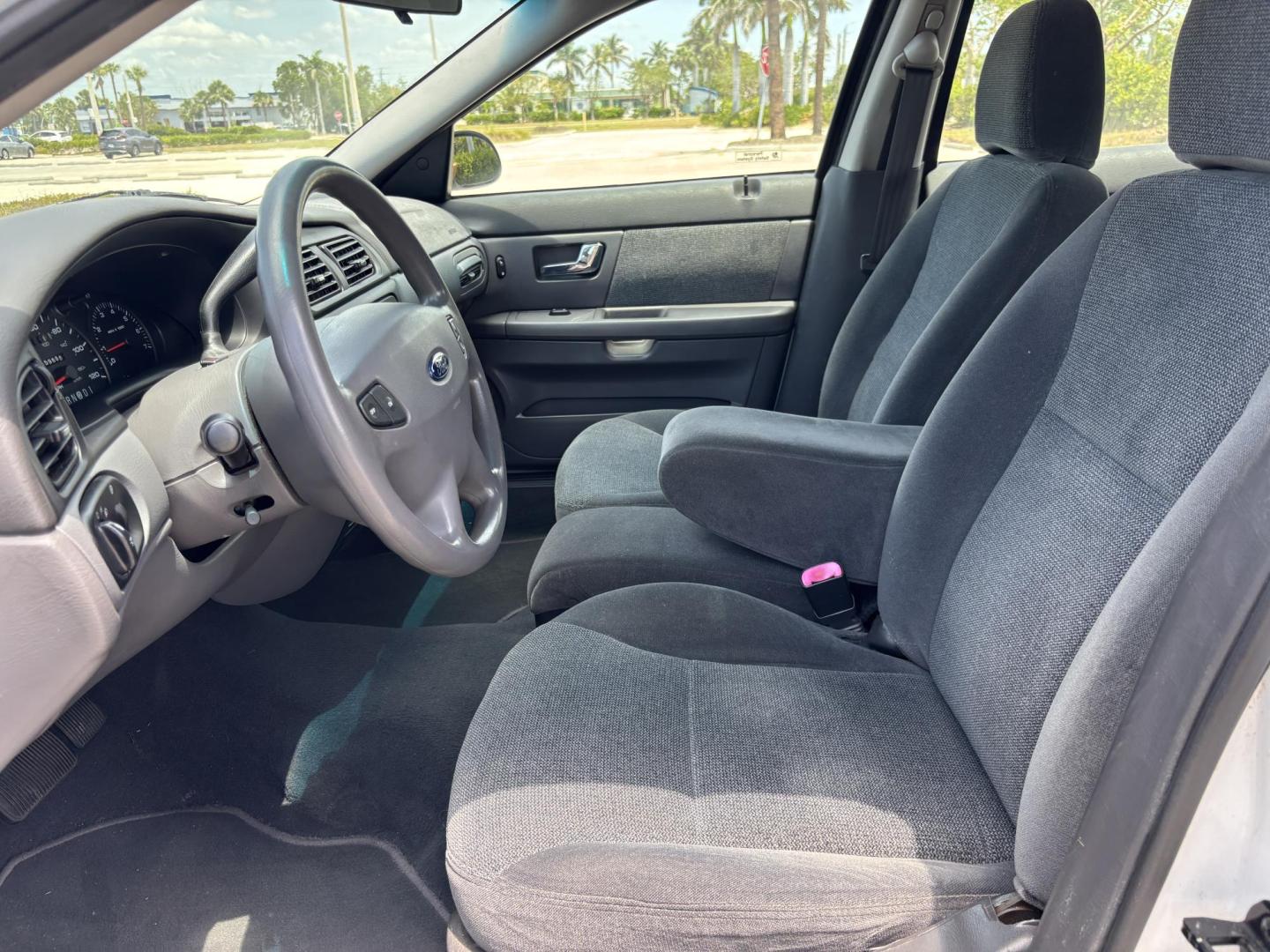 2001 WHITE /CHARCOAL Ford Taurus SE (1FAFP53U51G) with an 3.0L V6 OHV 12V engine, 4-Speed Automatic Overdrive transmission, located at 11170 Summerlin Square Dr., Fort Myers Beach, FL, 33931, (239) 999-7777, 26.493546, -81.941628 - We have financing available and we accept trades! Fill out a credit application on our website or come by today! If you have any questions, give us a call at (239) 999 - 7777 or visit our website at firstautocredit.com. 11170 Summerlin Square Dr, Fort Myers Beach, FL 33931 Carfax No Damage - Photo#9
