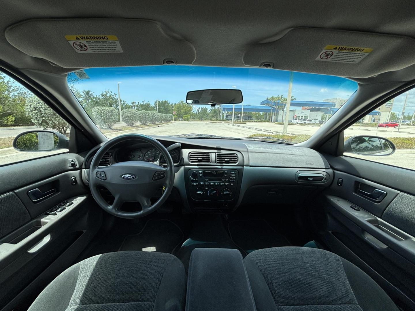 2001 WHITE /CHARCOAL Ford Taurus SE (1FAFP53U51G) with an 3.0L V6 OHV 12V engine, 4-Speed Automatic Overdrive transmission, located at 11170 Summerlin Square Dr., Fort Myers Beach, FL, 33931, (239) 999-7777, 26.493546, -81.941628 - We have financing available and we accept trades! Fill out a credit application on our website or come by today! If you have any questions, give us a call at (239) 999 - 7777 or visit our website at firstautocredit.com. 11170 Summerlin Square Dr, Fort Myers Beach, FL 33931 Carfax No Damage - Photo#8