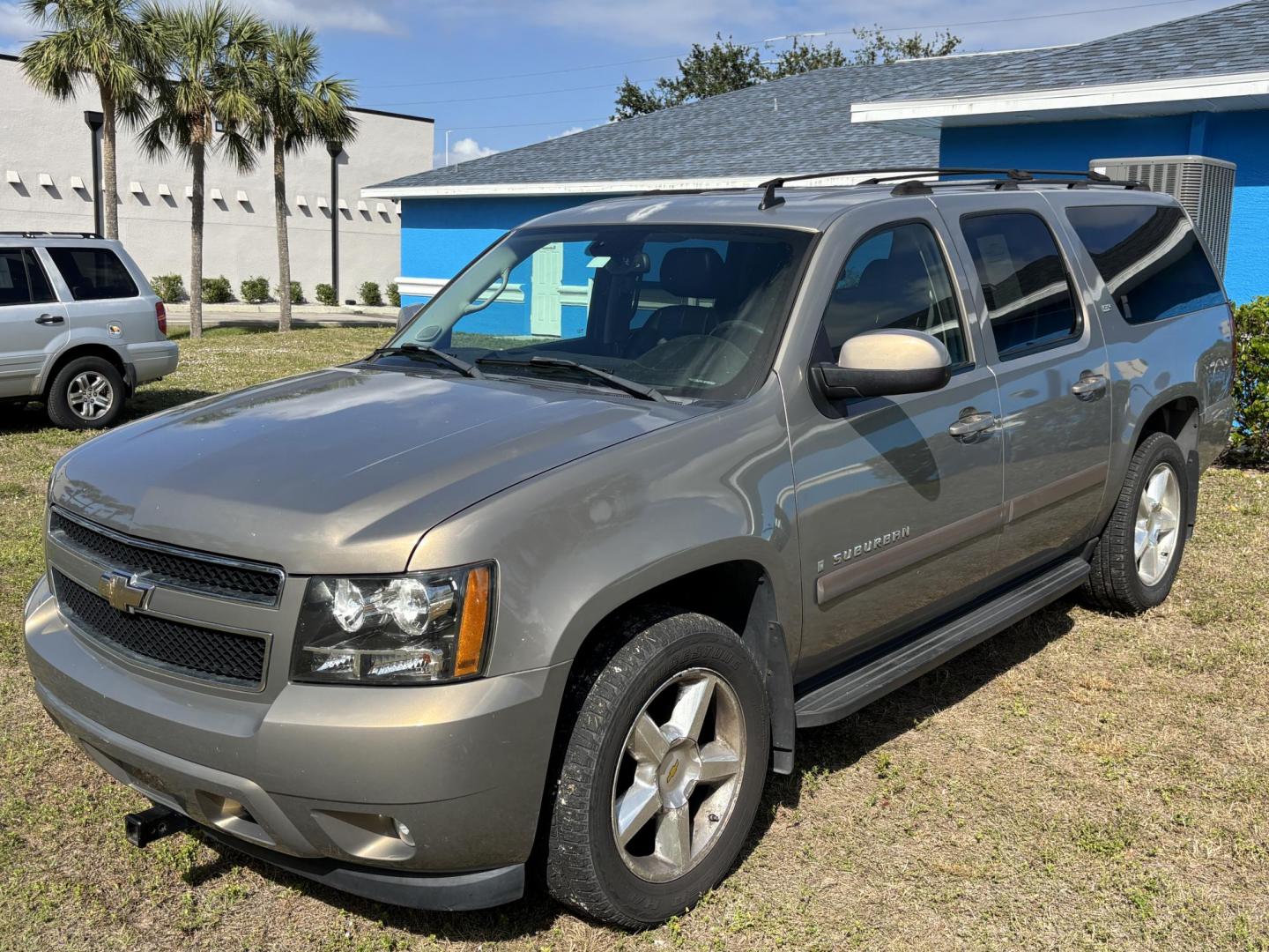 2007 BRONZE /Black Leather CHEVROLET SUBURBAN 1500 (1GNFK16357J) with an 5.3L engine, Automatic transmission, located at 11170 Summerlin Square Dr., Fort Myers Beach, FL, 33931, (239) 999-7777, 26.493546, -81.941628 - Photo#0