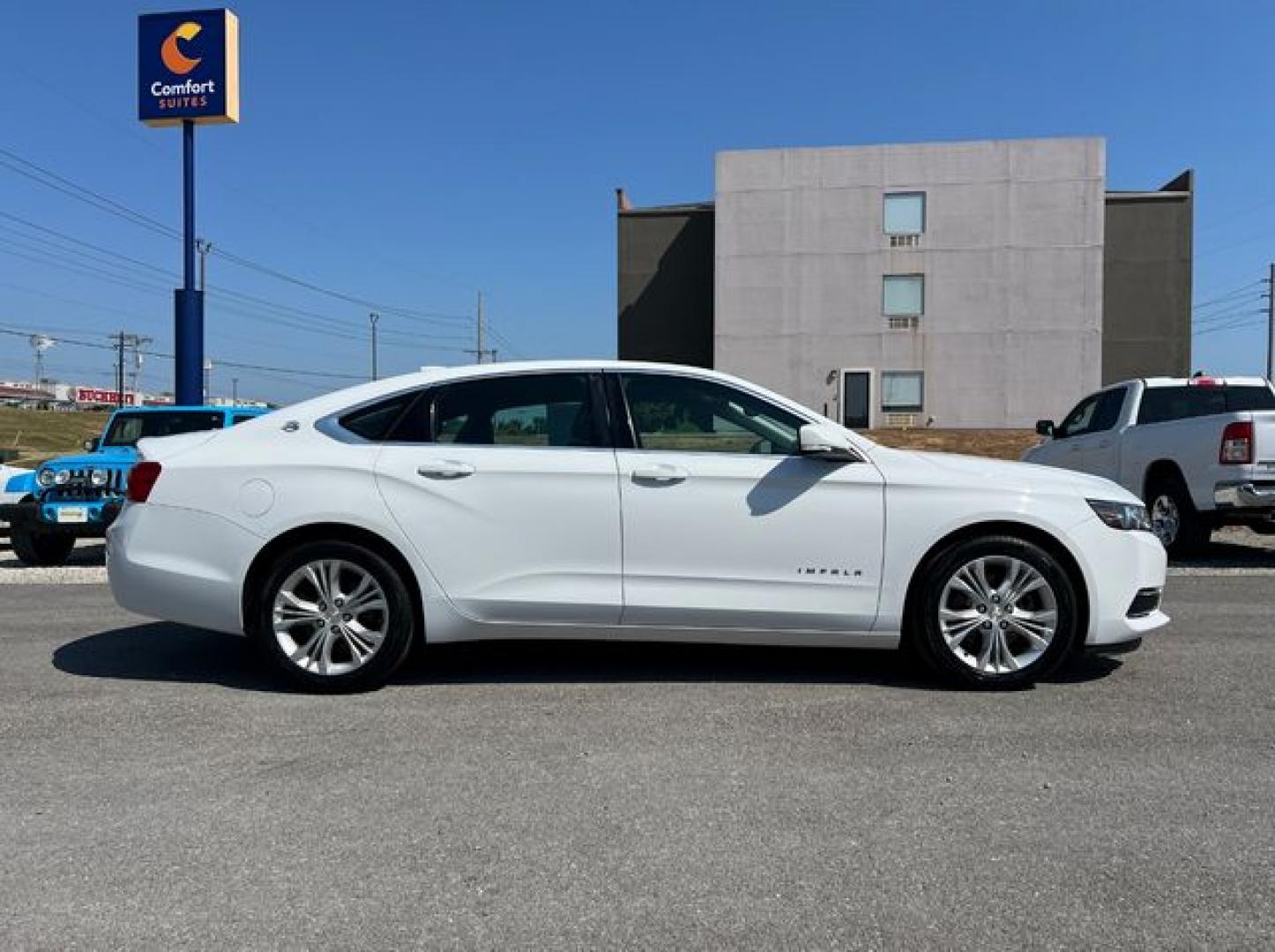 2015 WHITE /Black Leather/Cloth CHEVROLET IMPALA LT (2G1115SL9F9) with an 2.5L engine, Automatic transmission, located at 11170 Summerlin Square Dr., Fort Myers Beach, FL, 33931, (239) 999-7777, 26.493546, -81.941628 - Photo#4