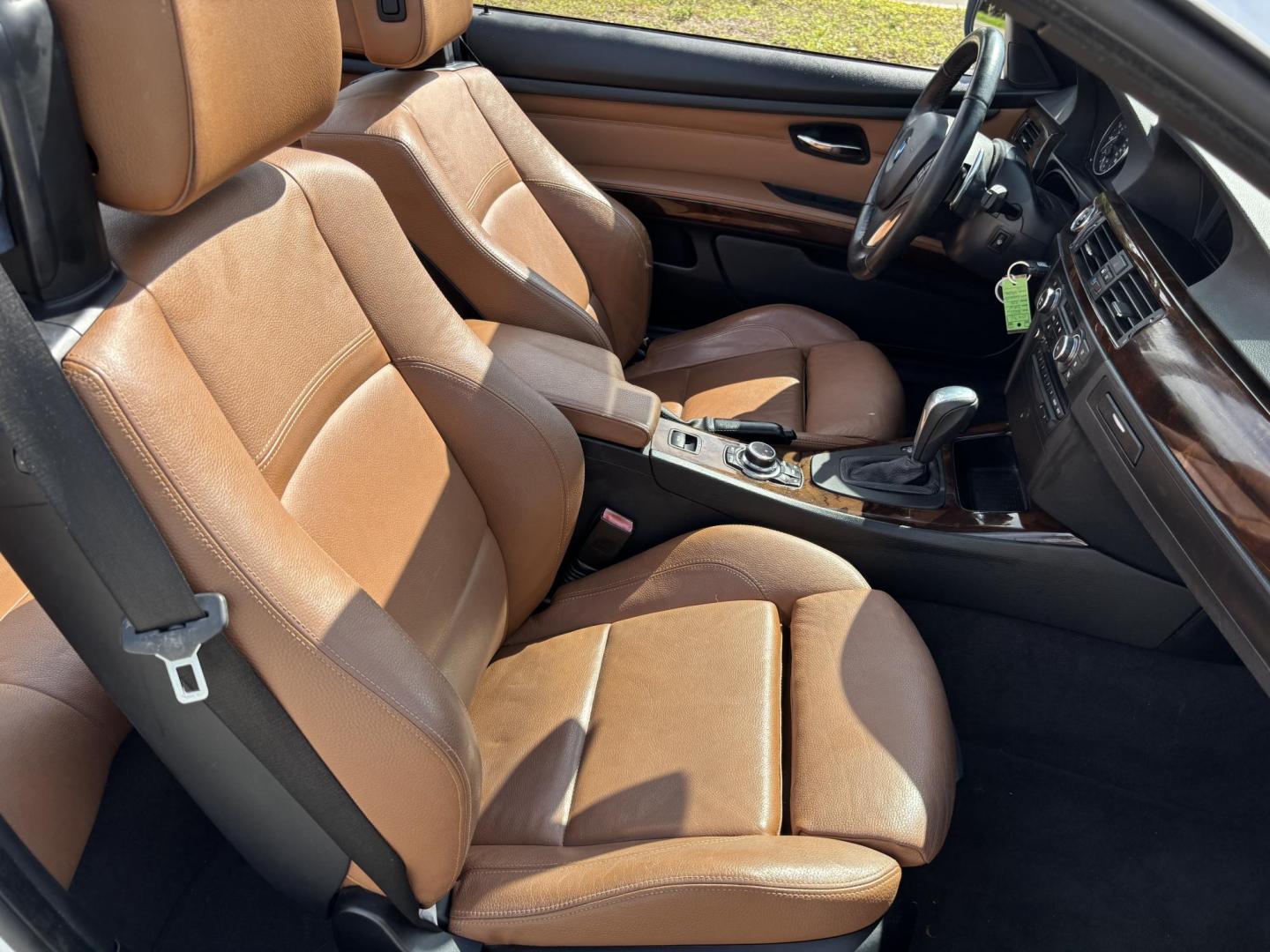 2011 WHITE /BEIGE BMW 328i Convertible Hardtop I SULEV (WBADW7C54BE) with an 3.0L engine, Automatic transmission, located at 11170 Summerlin Square Dr., Fort Myers Beach, FL, 33931, (239) 999-7777, 26.493546, -81.941628 - We have financing available and we accept trades! Fill out a credit application on our website or come by today! If you have any questions, give us a call at (239) 999 - 7777 or visit our website at firstautocredit.com. 11170 Summerlin Square Dr, Fort Myers Beach, FL 33931 - Photo#23