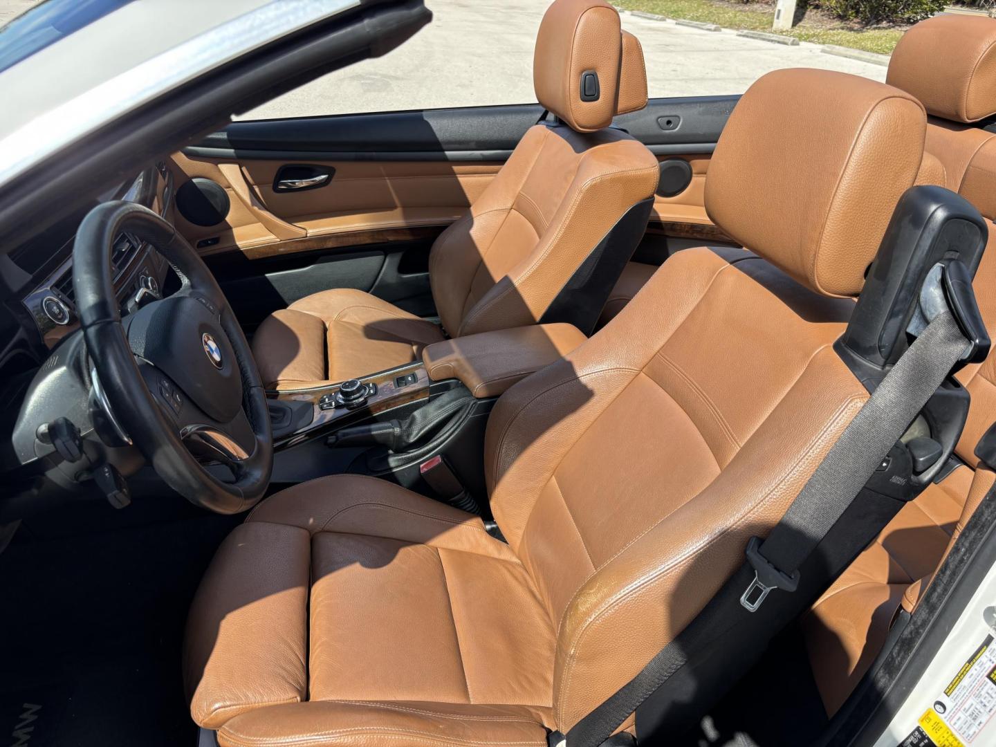 2011 WHITE /BEIGE BMW 328i Convertible Hardtop I SULEV (WBADW7C54BE) with an 3.0L engine, Automatic transmission, located at 11170 Summerlin Square Dr., Fort Myers Beach, FL, 33931, (239) 999-7777, 26.493546, -81.941628 - We have financing available and we accept trades! Fill out a credit application on our website or come by today! If you have any questions, give us a call at (239) 999 - 7777 or visit our website at firstautocredit.com. 11170 Summerlin Square Dr, Fort Myers Beach, FL 33931 - Photo#22