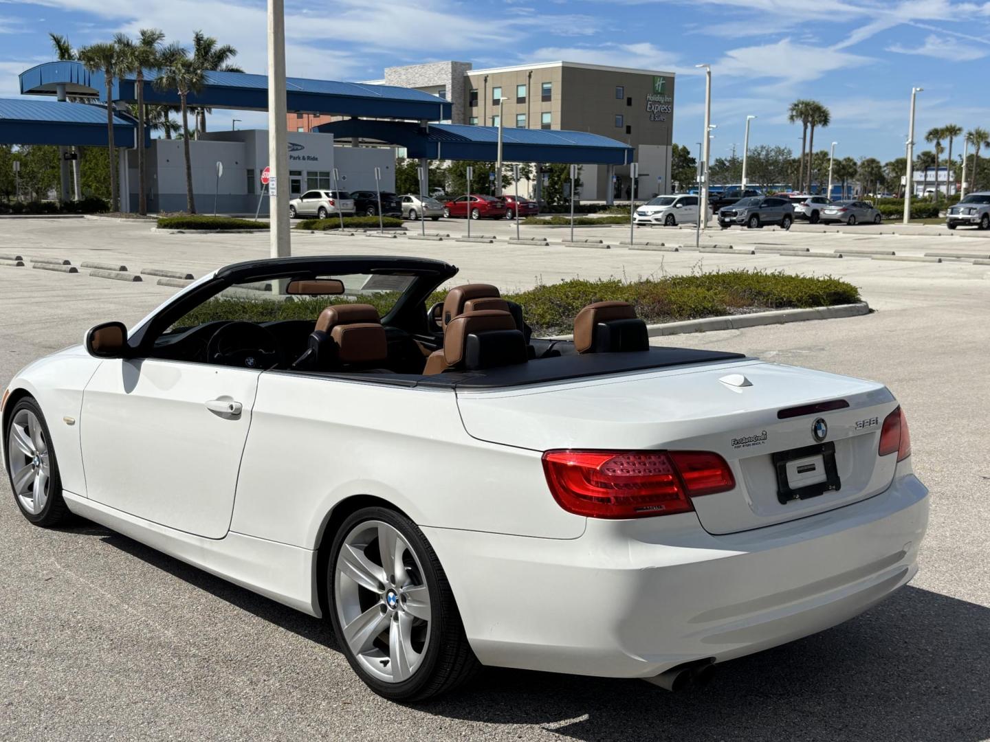2011 WHITE /BEIGE BMW 328i Convertible Hardtop I SULEV (WBADW7C54BE) with an 3.0L engine, Automatic transmission, located at 11170 Summerlin Square Dr., Fort Myers Beach, FL, 33931, (239) 999-7777, 26.493546, -81.941628 - We have financing available and we accept trades! Fill out a credit application on our website or come by today! If you have any questions, give us a call at (239) 999 - 7777 or visit our website at firstautocredit.com. 11170 Summerlin Square Dr, Fort Myers Beach, FL 33931 - Photo#12
