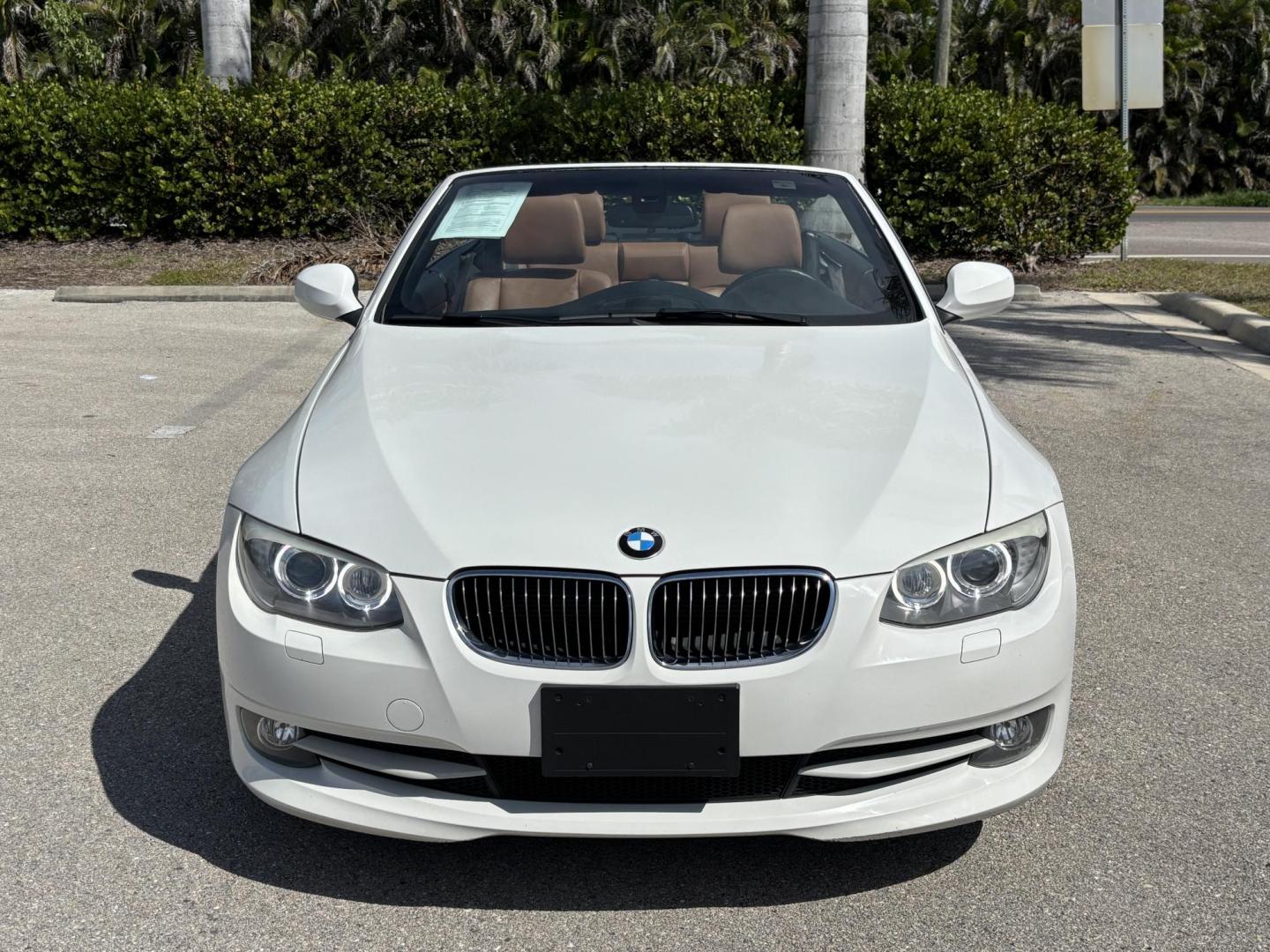 2011 WHITE /BEIGE BMW 328i Convertible Hardtop I SULEV (WBADW7C54BE) with an 3.0L engine, Automatic transmission, located at 11170 Summerlin Square Dr., Fort Myers Beach, FL, 33931, (239) 999-7777, 26.493546, -81.941628 - We have financing available and we accept trades! Fill out a credit application on our website or come by today! If you have any questions, give us a call at (239) 999 - 7777 or visit our website at firstautocredit.com. 11170 Summerlin Square Dr, Fort Myers Beach, FL 33931 - Photo#9