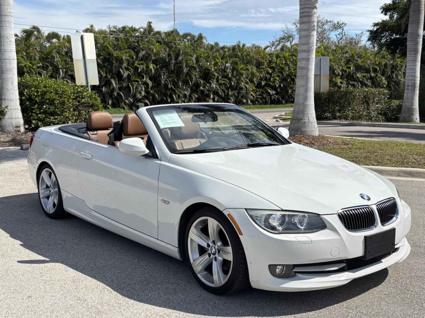 2011 WHITE /BEIGE BMW 328i Convertible Hardtop I SULEV (WBADW7C54BE) with an 3.0L engine, Automatic transmission, located at 11170 Summerlin Square Dr., Fort Myers Beach, FL, 33931, (239) 999-7777, 26.493546, -81.941628 - We have financing available and we accept trades! Fill out a credit application on our website or come by today! If you have any questions, give us a call at (239) 999 - 7777 or visit our website at firstautocredit.com. 11170 Summerlin Square Dr, Fort Myers Beach, FL 33931 - Photo#10