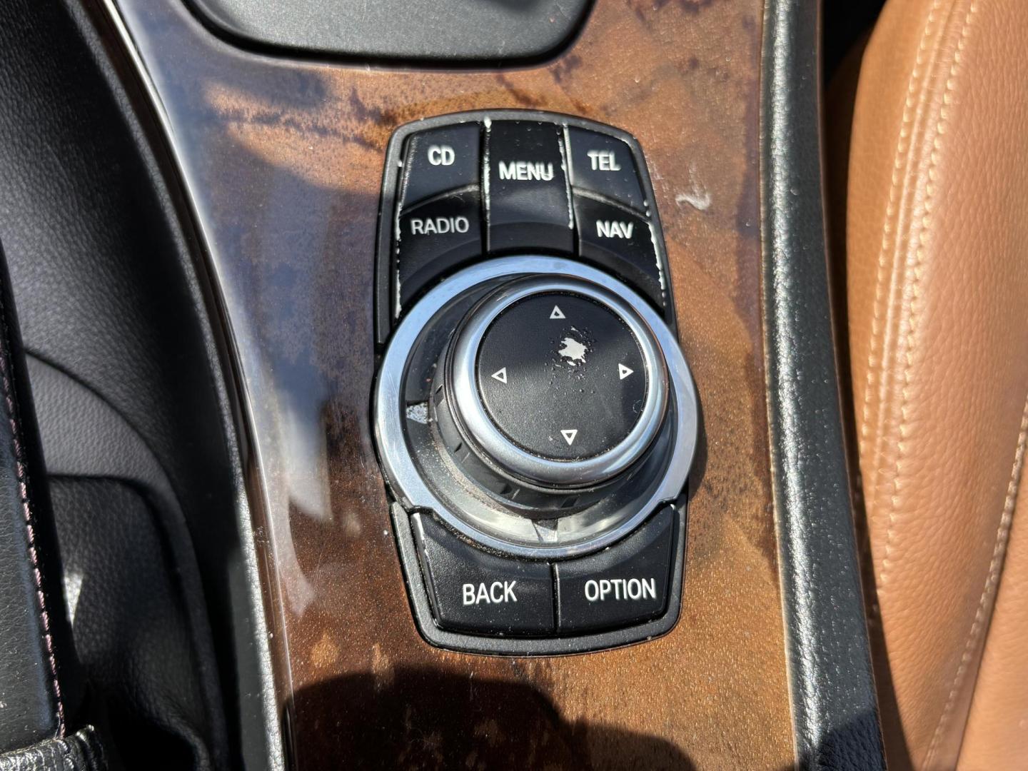 2011 WHITE /BEIGE BMW 328i Convertible Hardtop I SULEV (WBADW7C54BE) with an 3.0L engine, Automatic transmission, located at 11170 Summerlin Square Dr., Fort Myers Beach, FL, 33931, (239) 999-7777, 26.493546, -81.941628 - We have financing available and we accept trades! Fill out a credit application on our website or come by today! If you have any questions, give us a call at (239) 999 - 7777 or visit our website at firstautocredit.com. 11170 Summerlin Square Dr, Fort Myers Beach, FL 33931 - Photo#34