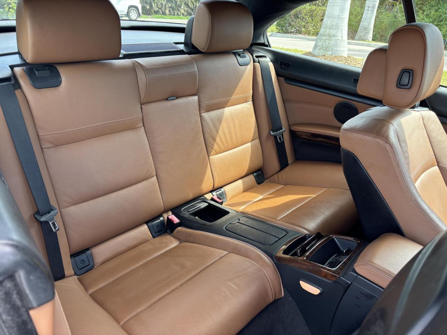 2011 WHITE /BEIGE BMW 328i Convertible Hardtop I SULEV (WBADW7C54BE) with an 3.0L engine, Automatic transmission, located at 11170 Summerlin Square Dr., Fort Myers Beach, FL, 33931, (239) 999-7777, 26.493546, -81.941628 - We have financing available and we accept trades! Fill out a credit application on our website or come by today! If you have any questions, give us a call at (239) 999 - 7777 or visit our website at firstautocredit.com. 11170 Summerlin Square Dr, Fort Myers Beach, FL 33931 - Photo#21