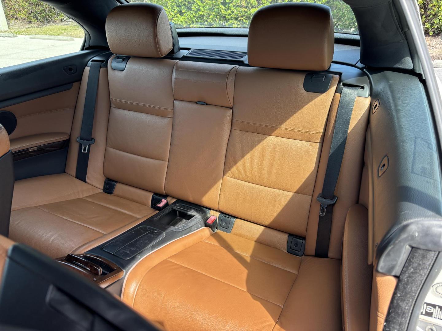 2011 WHITE /BEIGE BMW 328i Convertible Hardtop I SULEV (WBADW7C54BE) with an 3.0L engine, Automatic transmission, located at 11170 Summerlin Square Dr., Fort Myers Beach, FL, 33931, (239) 999-7777, 26.493546, -81.941628 - We have financing available and we accept trades! Fill out a credit application on our website or come by today! If you have any questions, give us a call at (239) 999 - 7777 or visit our website at firstautocredit.com. 11170 Summerlin Square Dr, Fort Myers Beach, FL 33931 - Photo#20