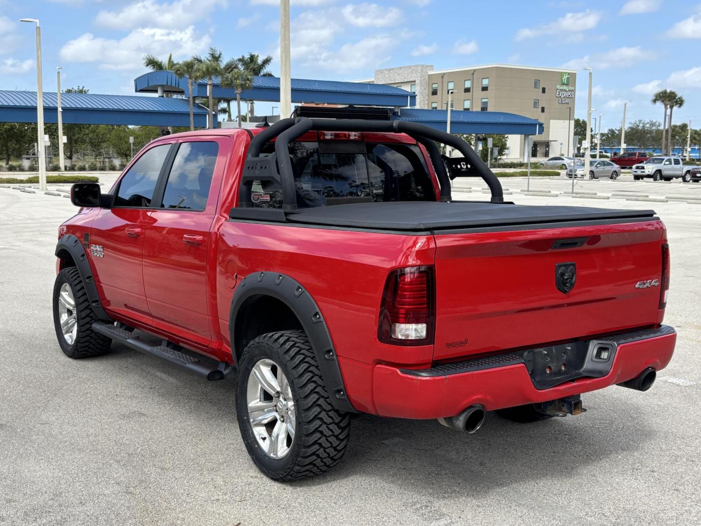 2018 RED /BLACK RAM 1500 SPORT (1C6RR7MT6JS) with an 5.7L engine, Automatic transmission, located at 11170 Summerlin Square Dr., Fort Myers Beach, FL, 33931, (239) 999-7777, 26.493546, -81.941628 - We have financing available and we accept trades! Fill out a credit application on our website or come by today! If you have any questions, give us a call at (239) 999 - 7777 or visit our website at firstautocredit.com. 11170 Summerlin Square Dr, Fort Myers Beach, FL 33931 Carfax 1 Owner N - Photo#4