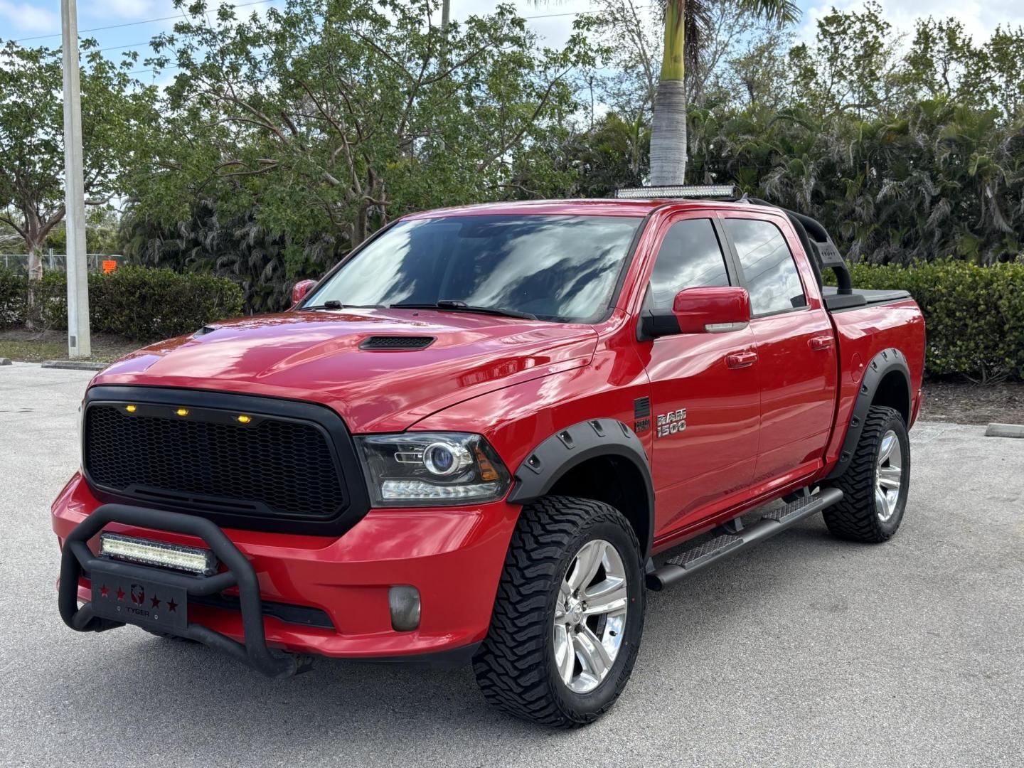 2018 RED /BLACK RAM 1500 SPORT (1C6RR7MT6JS) with an 5.7L engine, Automatic transmission, located at 11170 Summerlin Square Dr., Fort Myers Beach, FL, 33931, (239) 999-7777, 26.493546, -81.941628 - We have financing available and we accept trades! Fill out a credit application on our website or come by today! If you have any questions, give us a call at (239) 999 - 7777 or visit our website at firstautocredit.com. 11170 Summerlin Square Dr, Fort Myers Beach, FL 33931 Carfax 1 Owner N - Photo#0