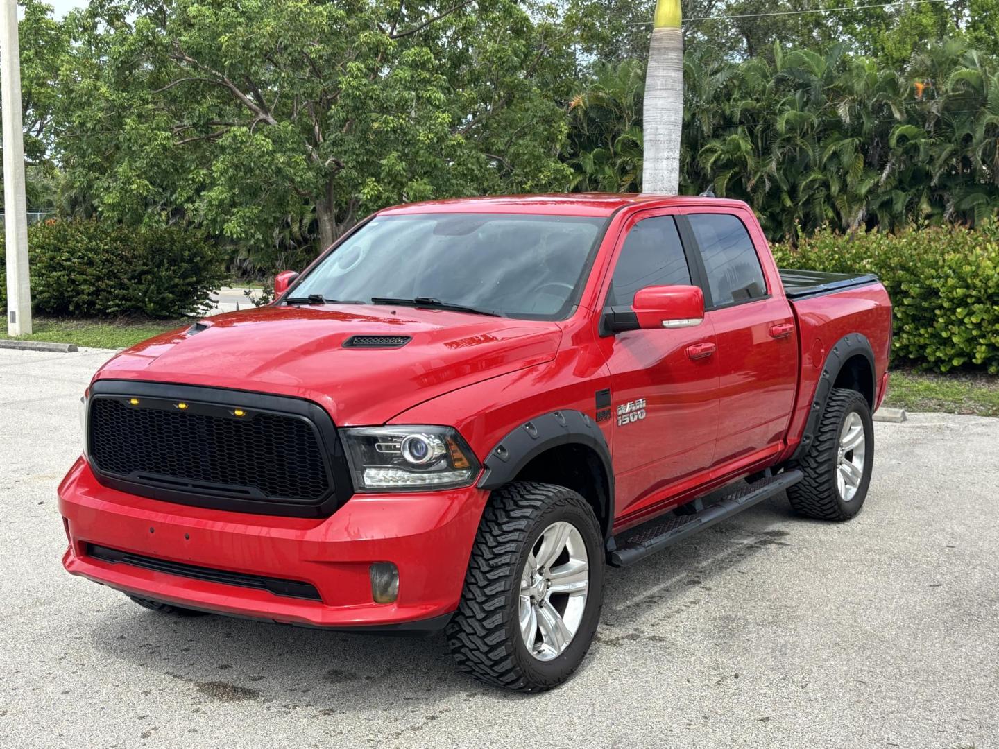 2018 RED /BLACK RAM 1500 SPORT (1C6RR7MT6JS) with an 5.7L engine, Automatic transmission, located at 11170 Summerlin Square Dr., Fort Myers Beach, FL, 33931, (239) 999-7777, 26.493546, -81.941628 - We have financing available and we accept trades! Fill out a credit application on our website or come by today! If you have any questions, give us a call at (239) 999 - 7777 or visit our website at firstautocredit.com. 11170 Summerlin Square Dr, Fort Myers Beach, FL 33931 Carfax 1 Owner N - Photo#0