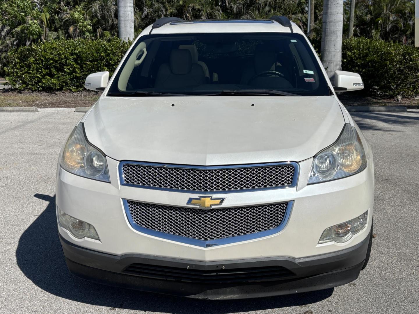2012 WHITE /Tan Leather CHEVROLET TRAVERSE LTZ (1GNKVLED1CJ) with an 3.6L engine, Automatic transmission, located at 11170 Summerlin Square Dr., Fort Myers Beach, FL, 33931, (239) 999-7777, 26.493546, -81.941628 - Rear Entertainment Bucket Seats Mid Row 3rd Row - Photo#1