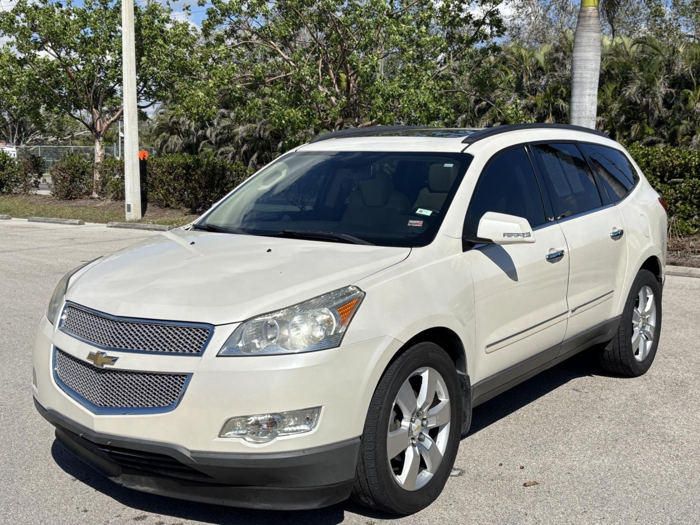 2012 WHITE /Tan Leather CHEVROLET TRAVERSE LTZ (1GNKVLED1CJ) with an 3.6L engine, Automatic transmission, located at 11170 Summerlin Square Dr., Fort Myers Beach, FL, 33931, (239) 999-7777, 26.493546, -81.941628 - Rear Entertainment Bucket Seats Mid Row 3rd Row - Photo#0