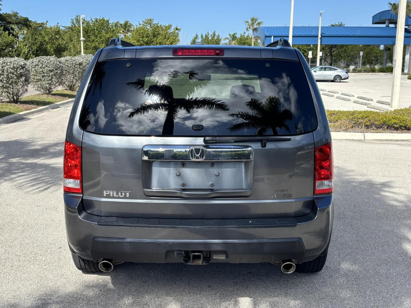 2010 GREEN Honda Pilot EX-L 4WD 5-Spd AT (5FNYF4H57AB) with an 3.5L V6 SOHC 24V engine, 5-Speed Automatic transmission, located at 11170 Summerlin Square Dr., Fort Myers Beach, FL, 33931, (239) 999-7777, 26.493546, -81.941628 - Photo#5
