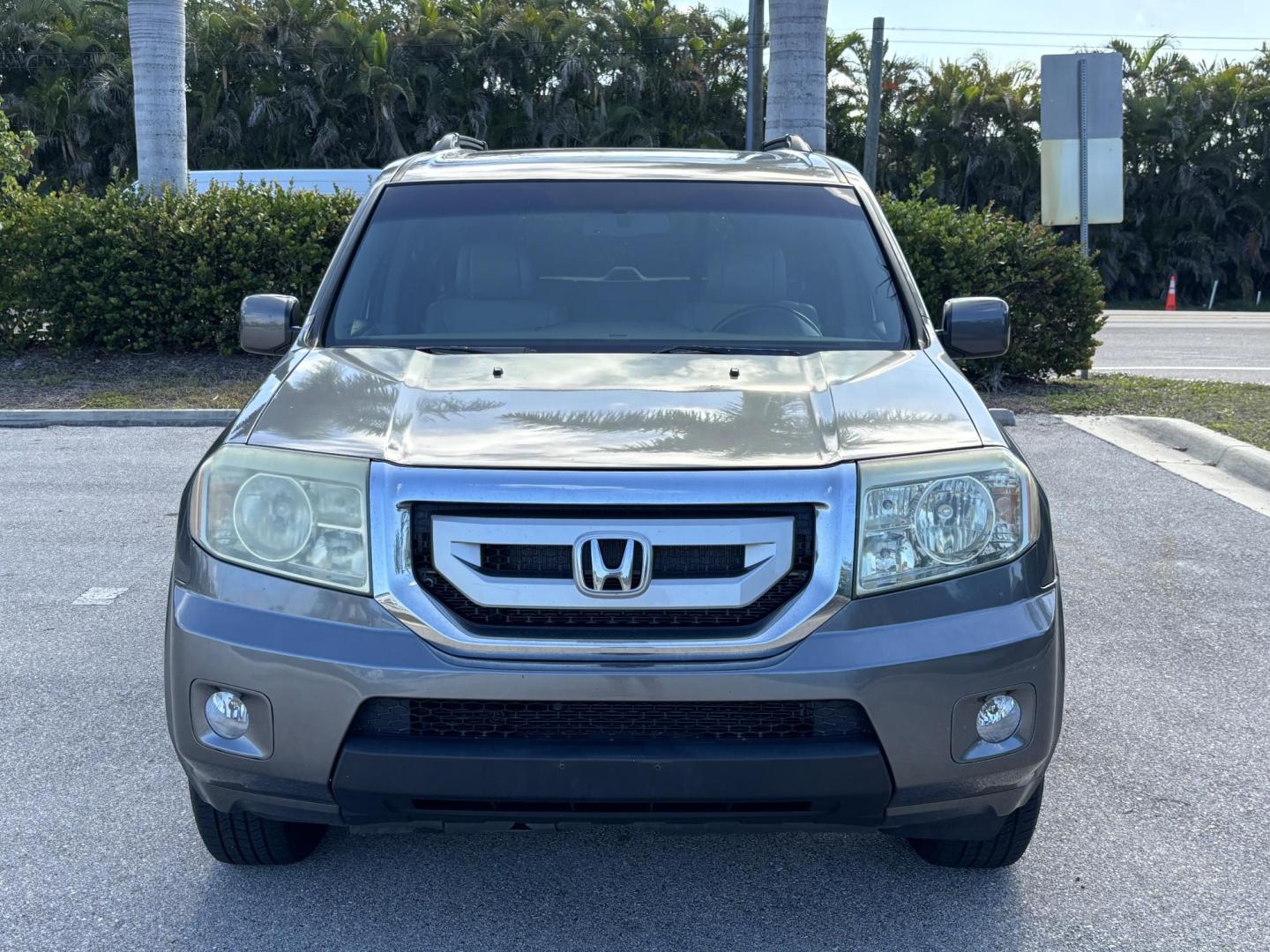 2010 GREEN Honda Pilot EX-L 4WD 5-Spd AT (5FNYF4H57AB) with an 3.5L V6 SOHC 24V engine, 5-Speed Automatic transmission, located at 11170 Summerlin Square Dr., Fort Myers Beach, FL, 33931, (239) 999-7777, 26.493546, -81.941628 - Photo#1