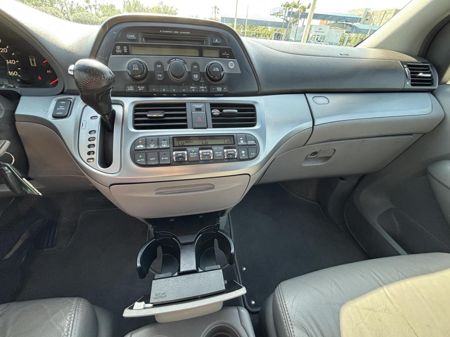 2009 BLUE /TAN Honda Odyssey EX-L (5FNRL38619B) with an 3.5L V6 SOHC 24V engine, 5-Speed Automatic transmission, located at 11170 Summerlin Square Dr., Fort Myers Beach, FL, 33931, (239) 999-7777, 26.493546, -81.941628 - Photo#22