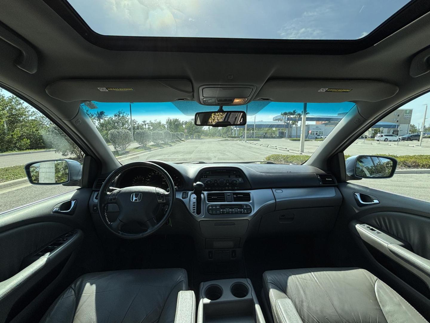 2009 BLUE /TAN Honda Odyssey EX-L (5FNRL38619B) with an 3.5L V6 SOHC 24V engine, 5-Speed Automatic transmission, located at 11170 Summerlin Square Dr., Fort Myers Beach, FL, 33931, (239) 999-7777, 26.493546, -81.941628 - Photo#8