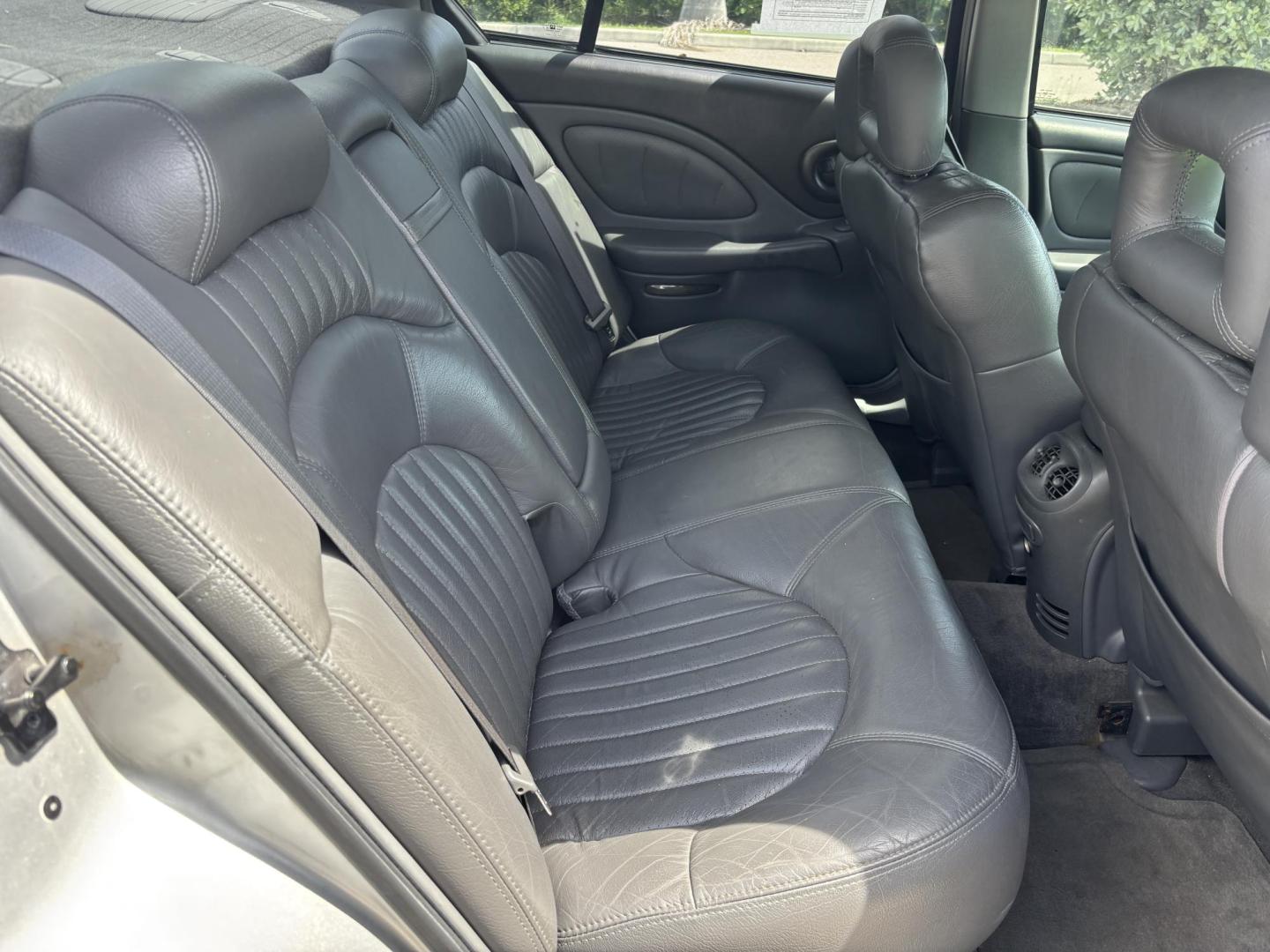 2000 SILVER /GRAY LEATHER Pontiac Bonneville SE (1G2HX54KXY4) with an 3.8L V6 OHV 12V engine, 4-Speed Automatic Overdrive transmission, located at 11170 Summerlin Square Dr., Fort Myers Beach, FL, 33931, (239) 999-7777, 26.493546, -81.941628 - We have financing available and we accept trades! Fill out a credit application on our website or come by today! If you have any questions, give us a call at (239) 999 - 7777 or visit our website at firstautocredit.com. 11170 Summerlin Square Dr, Fort Myers Beach, FL 33931 As Is Due To Veh - Photo#12