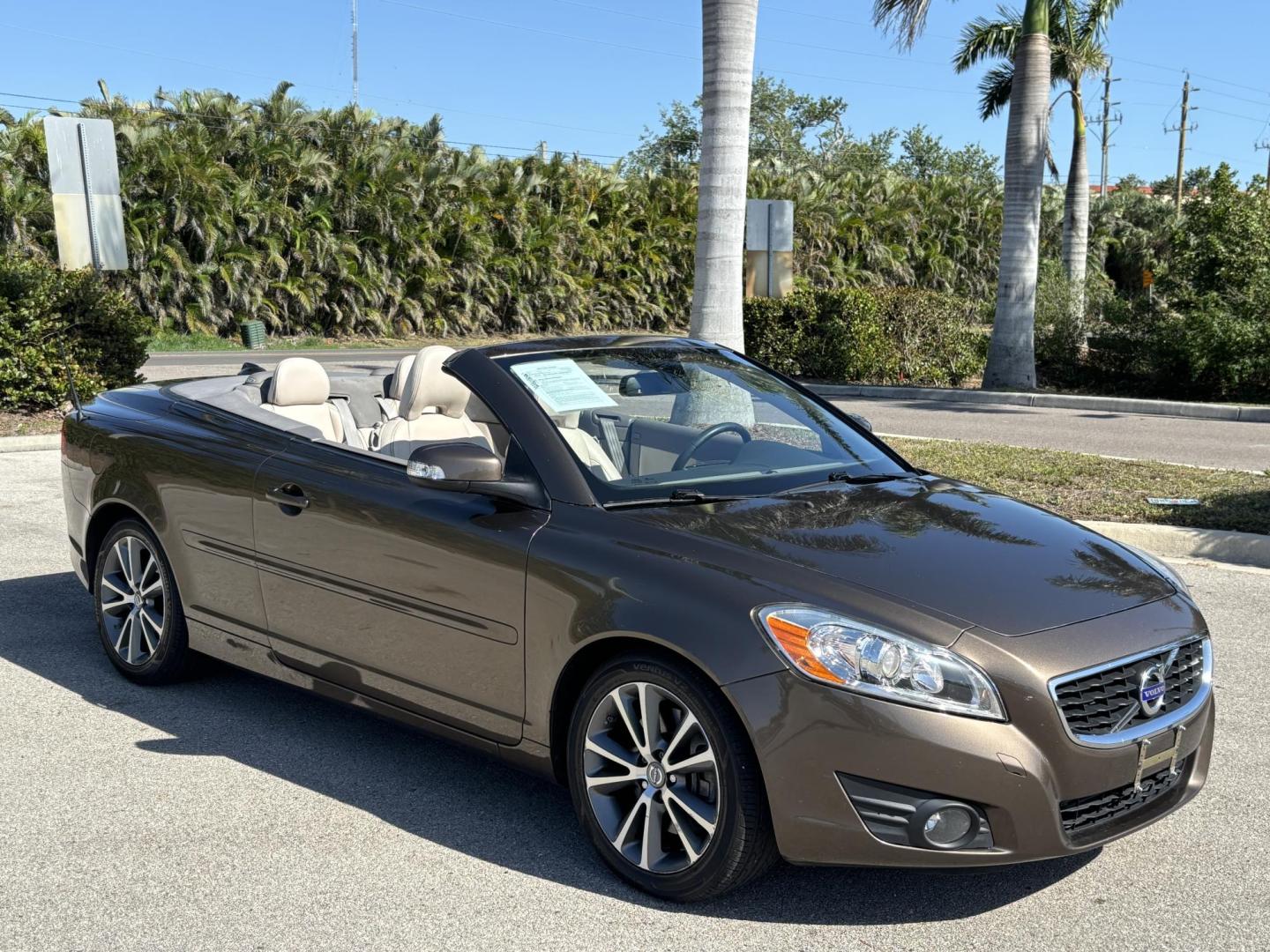 2012 BROWN /TAN Volvo C70 Convertible Hardtop T5 (YV1672MC2CJ) with an 2.5L L5 DOHC 20V TURBO engine, 6-Speed Manual Overdrive transmission, located at 11170 Summerlin Square Dr., Fort Myers Beach, FL, 33931, (239) 999-7777, 26.493546, -81.941628 - We have financing available and we accept trades! Fill out a credit application on our website or come by today! If you have any questions, give us a call at (239) 999 - 7777 or visit our website at firstautocredit.com. 11170 Summerlin Square Dr, Fort Myers Beach, FL 33931 - Photo#2