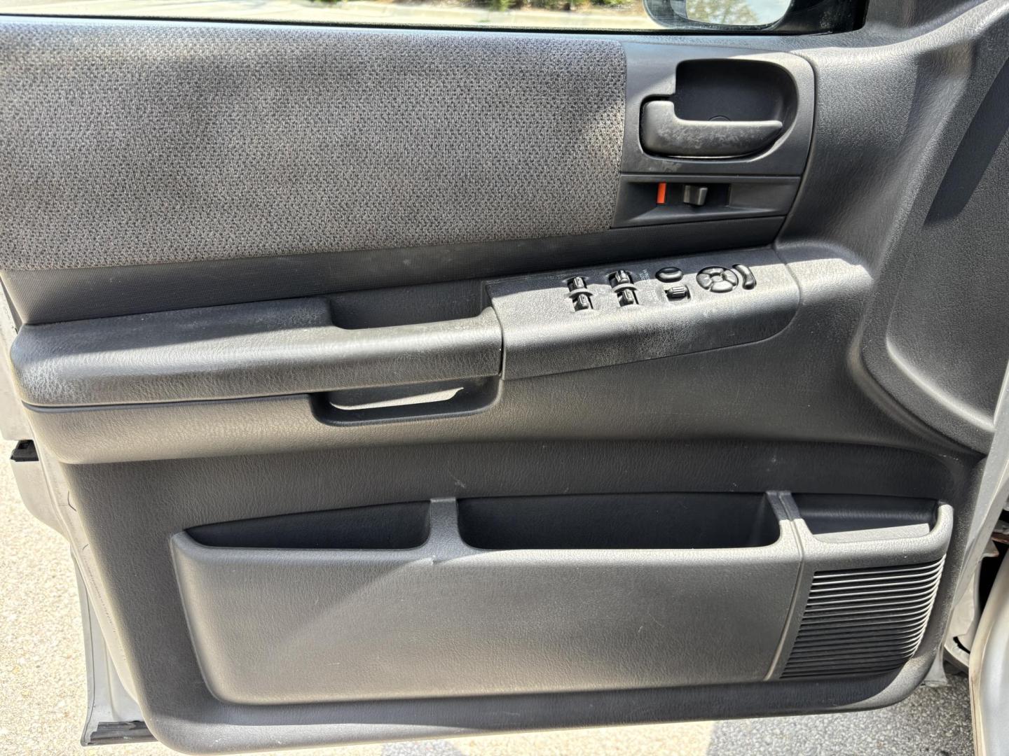 2004 GRAY /GRAY Dodge Dakota SLT Plus Quad Cab 2WD (1D7HL48N54S) with an 4.7L V8 SOHC 16V engine, AUTOMATIC transmission, located at 11170 Summerlin Square Dr., Fort Myers Beach, FL, 33931, (239) 999-7777, 26.493546, -81.941628 - We have financing available and we accept trades! Fill out a credit application on our website or come by today! If you have any questions, give us a call at (239) 999 - 7777 or visit our website at firstautocredit.com. 11170 Summerlin Square Dr, Fort Myers Beach, FL 33931 - Photo#21