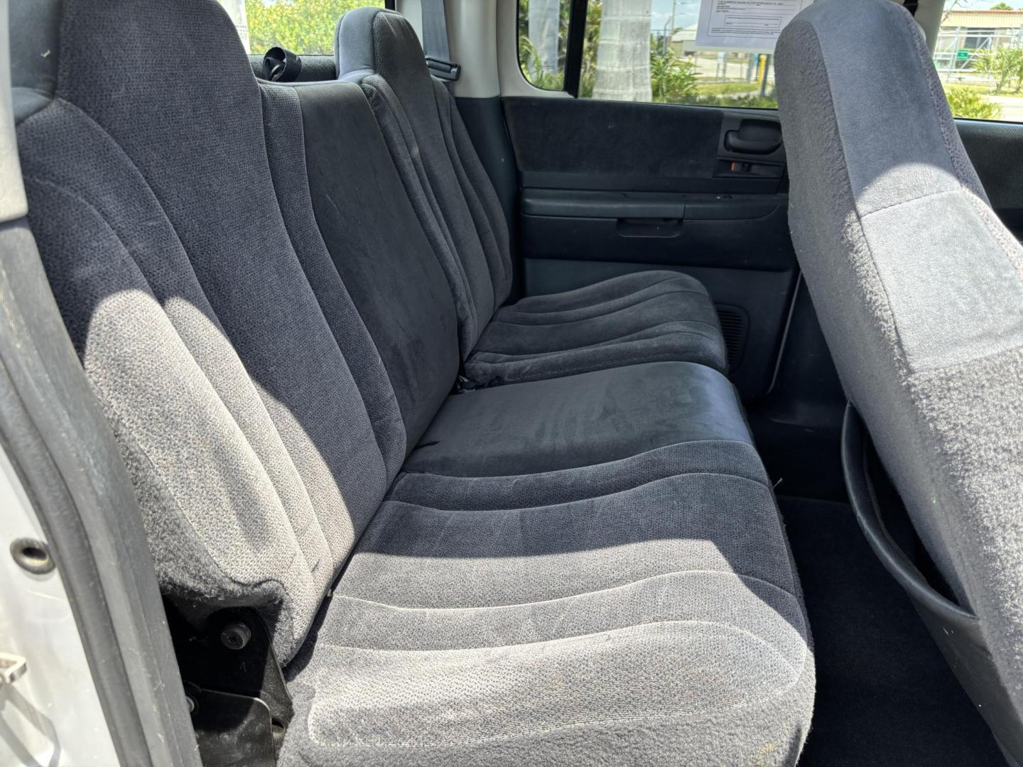 2004 GRAY /GRAY Dodge Dakota SLT Plus Quad Cab 2WD (1D7HL48N54S) with an 4.7L V8 SOHC 16V engine, AUTOMATIC transmission, located at 11170 Summerlin Square Dr., Fort Myers Beach, FL, 33931, (239) 999-7777, 26.493546, -81.941628 - We have financing available and we accept trades! Fill out a credit application on our website or come by today! If you have any questions, give us a call at (239) 999 - 7777 or visit our website at firstautocredit.com. 11170 Summerlin Square Dr, Fort Myers Beach, FL 33931 - Photo#15
