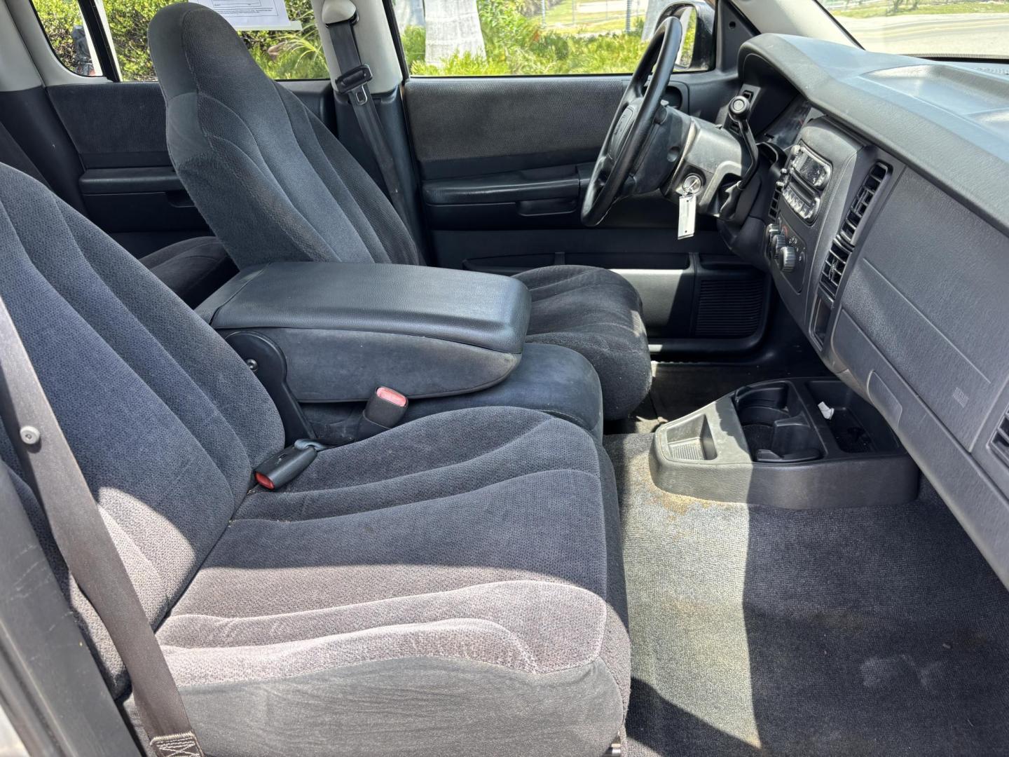 2004 GRAY /GRAY Dodge Dakota SLT Plus Quad Cab 2WD (1D7HL48N54S) with an 4.7L V8 SOHC 16V engine, AUTOMATIC transmission, located at 11170 Summerlin Square Dr., Fort Myers Beach, FL, 33931, (239) 999-7777, 26.493546, -81.941628 - We have financing available and we accept trades! Fill out a credit application on our website or come by today! If you have any questions, give us a call at (239) 999 - 7777 or visit our website at firstautocredit.com. 11170 Summerlin Square Dr, Fort Myers Beach, FL 33931 - Photo#13