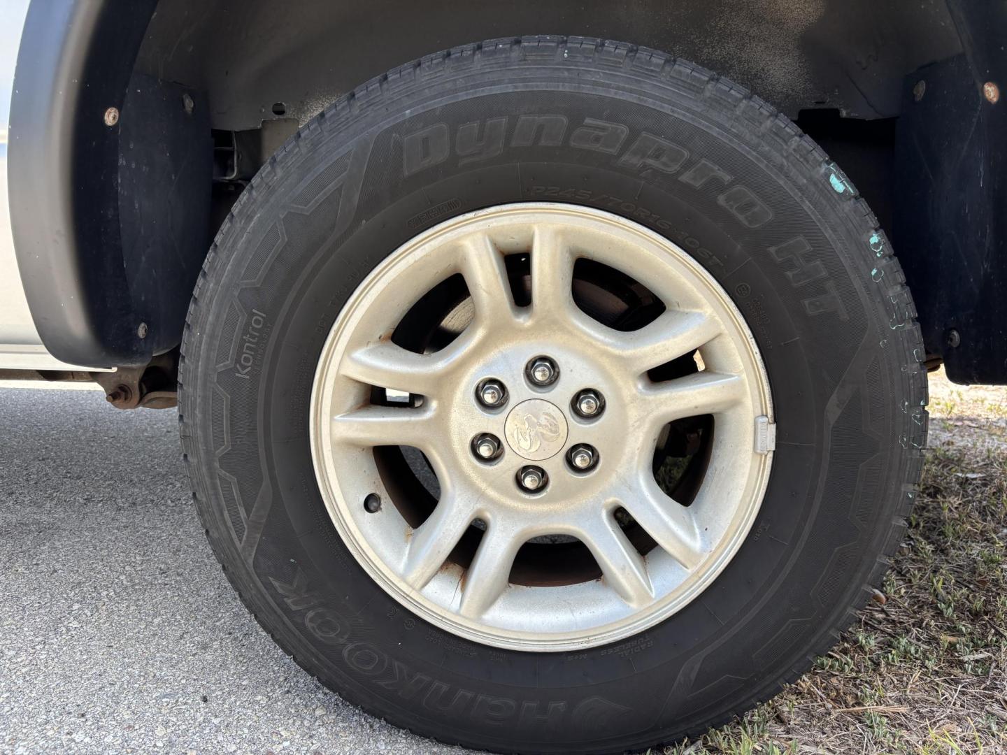 2004 GRAY /GRAY Dodge Dakota SLT Plus Quad Cab 2WD (1D7HL48N54S) with an 4.7L V8 SOHC 16V engine, AUTOMATIC transmission, located at 11170 Summerlin Square Dr., Fort Myers Beach, FL, 33931, (239) 999-7777, 26.493546, -81.941628 - We have financing available and we accept trades! Fill out a credit application on our website or come by today! If you have any questions, give us a call at (239) 999 - 7777 or visit our website at firstautocredit.com. 11170 Summerlin Square Dr, Fort Myers Beach, FL 33931 - Photo#29