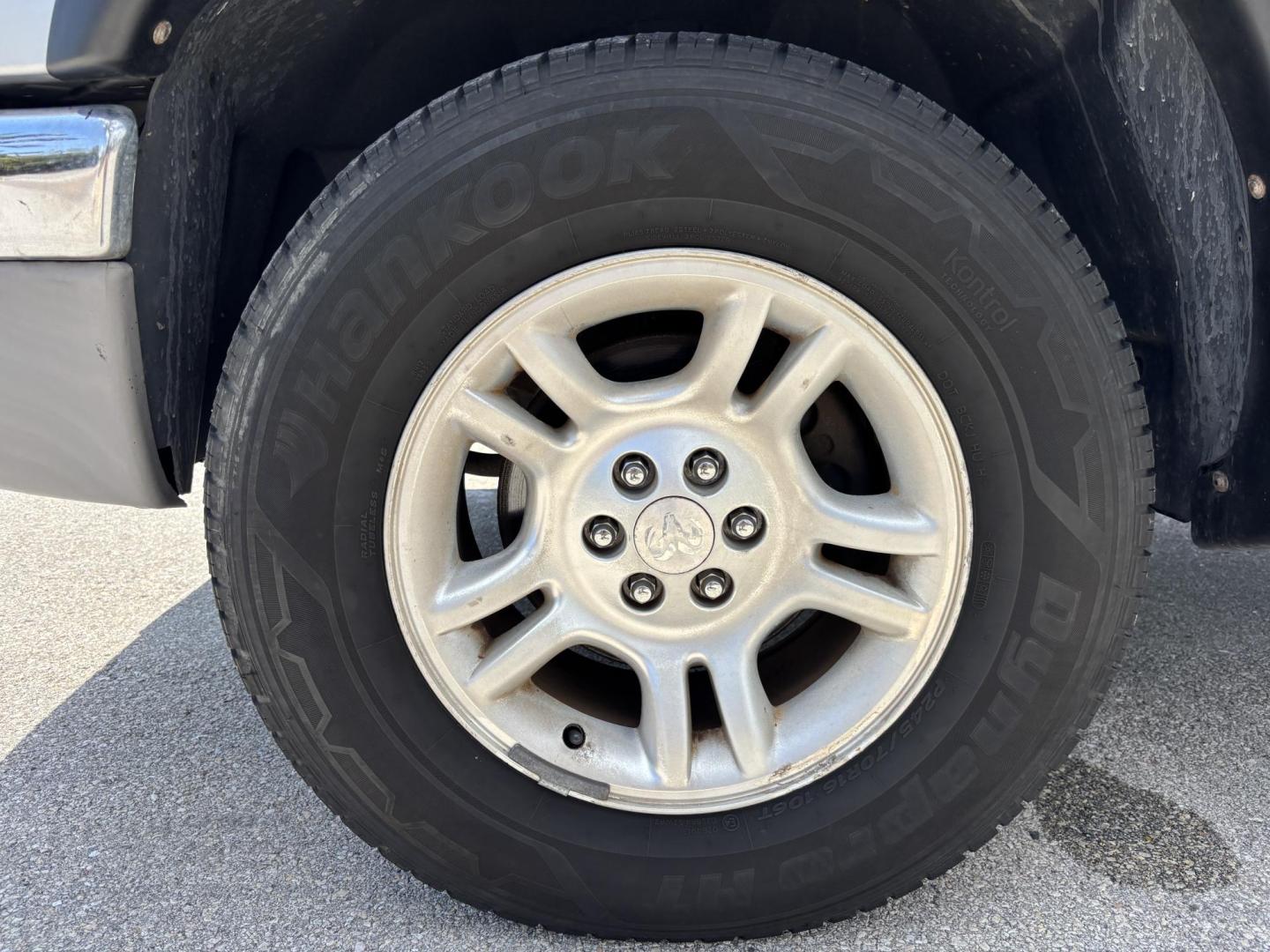2004 GRAY /GRAY Dodge Dakota SLT Plus Quad Cab 2WD (1D7HL48N54S) with an 4.7L V8 SOHC 16V engine, AUTOMATIC transmission, located at 11170 Summerlin Square Dr., Fort Myers Beach, FL, 33931, (239) 999-7777, 26.493546, -81.941628 - We have financing available and we accept trades! Fill out a credit application on our website or come by today! If you have any questions, give us a call at (239) 999 - 7777 or visit our website at firstautocredit.com. 11170 Summerlin Square Dr, Fort Myers Beach, FL 33931 - Photo#30