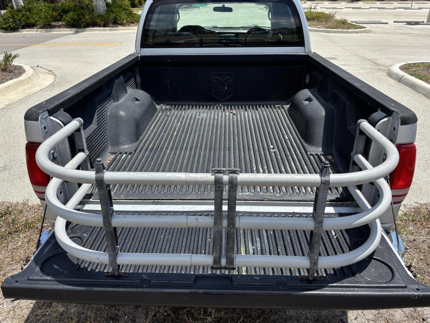 2004 GRAY /GRAY Dodge Dakota SLT Plus Quad Cab 2WD (1D7HL48N54S) with an 4.7L V8 SOHC 16V engine, AUTOMATIC transmission, located at 11170 Summerlin Square Dr., Fort Myers Beach, FL, 33931, (239) 999-7777, 26.493546, -81.941628 - We have financing available and we accept trades! Fill out a credit application on our website or come by today! If you have any questions, give us a call at (239) 999 - 7777 or visit our website at firstautocredit.com. 11170 Summerlin Square Dr, Fort Myers Beach, FL 33931 - Photo#24