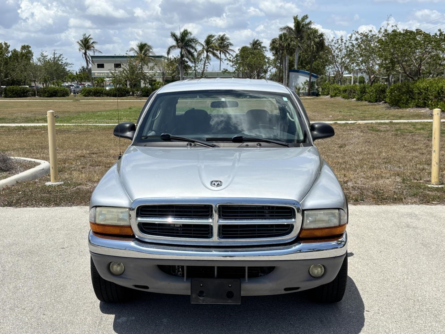 2004 GRAY /GRAY Dodge Dakota SLT Plus Quad Cab 2WD (1D7HL48N54S) with an 4.7L V8 SOHC 16V engine, AUTOMATIC transmission, located at 11170 Summerlin Square Dr., Fort Myers Beach, FL, 33931, (239) 999-7777, 26.493546, -81.941628 - We have financing available and we accept trades! Fill out a credit application on our website or come by today! If you have any questions, give us a call at (239) 999 - 7777 or visit our website at firstautocredit.com. 11170 Summerlin Square Dr, Fort Myers Beach, FL 33931 - Photo#1