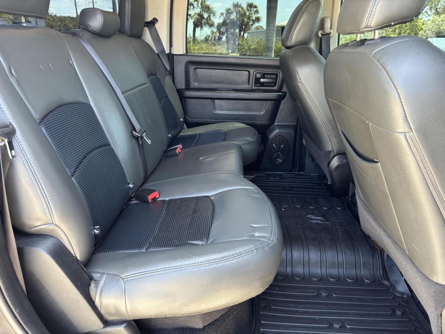 2018 GRAY RAM 1500 Tradesman Crew Cab SWB 2WD (1C6RR6KG2JS) with an 3.6L V6 DOHC 24V FFV engine, 8A transmission, located at 11170 Summerlin Square Dr., Fort Myers Beach, FL, 33931, (239) 999-7777, 26.493546, -81.941628 - 6” Lifted ram 37” Tires Amp power Steps Tinted Leather seats- Touch screen radio w/ 2x10”s under the back seat Wheel lights Underglows 4x2 - 3.6L V6 Automatic Transmission - Photo#14