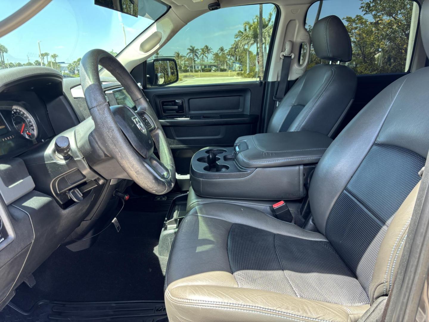 2018 GRAY RAM 1500 Tradesman Crew Cab SWB 2WD (1C6RR6KG2JS) with an 3.6L V6 DOHC 24V FFV engine, 8A transmission, located at 11170 Summerlin Square Dr., Fort Myers Beach, FL, 33931, (239) 999-7777, 26.493546, -81.941628 - 6” Lifted ram 37” Tires Amp power Steps Tinted Leather seats- Touch screen radio w/ 2x10”s under the back seat Wheel lights Underglows 4x2 - 3.6L V6 Automatic Transmission - Photo#9