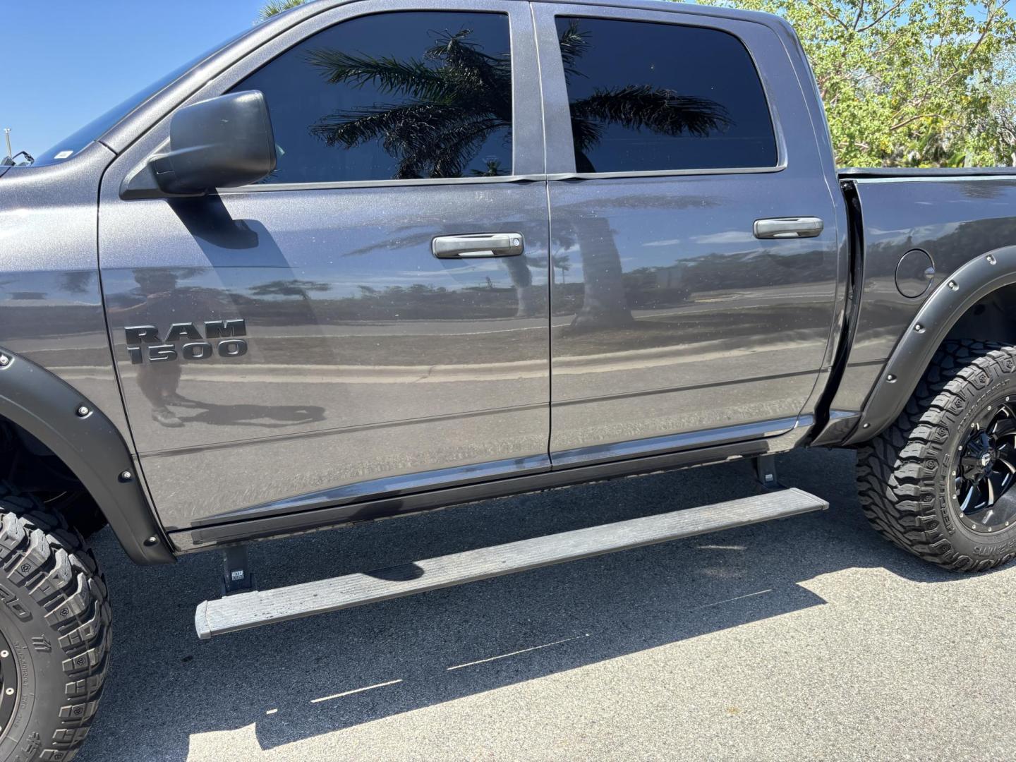 2018 GRAY RAM 1500 Tradesman Crew Cab SWB 2WD (1C6RR6KG2JS) with an 3.6L V6 DOHC 24V FFV engine, 8A transmission, located at 11170 Summerlin Square Dr., Fort Myers Beach, FL, 33931, (239) 999-7777, 26.493546, -81.941628 - 6” Lifted ram 37” Tires Amp power Steps Tinted Leather seats- Touch screen radio w/ 2x10”s under the back seat Wheel lights Underglows 4x2 - 3.6L V6 Automatic Transmission - Photo#5