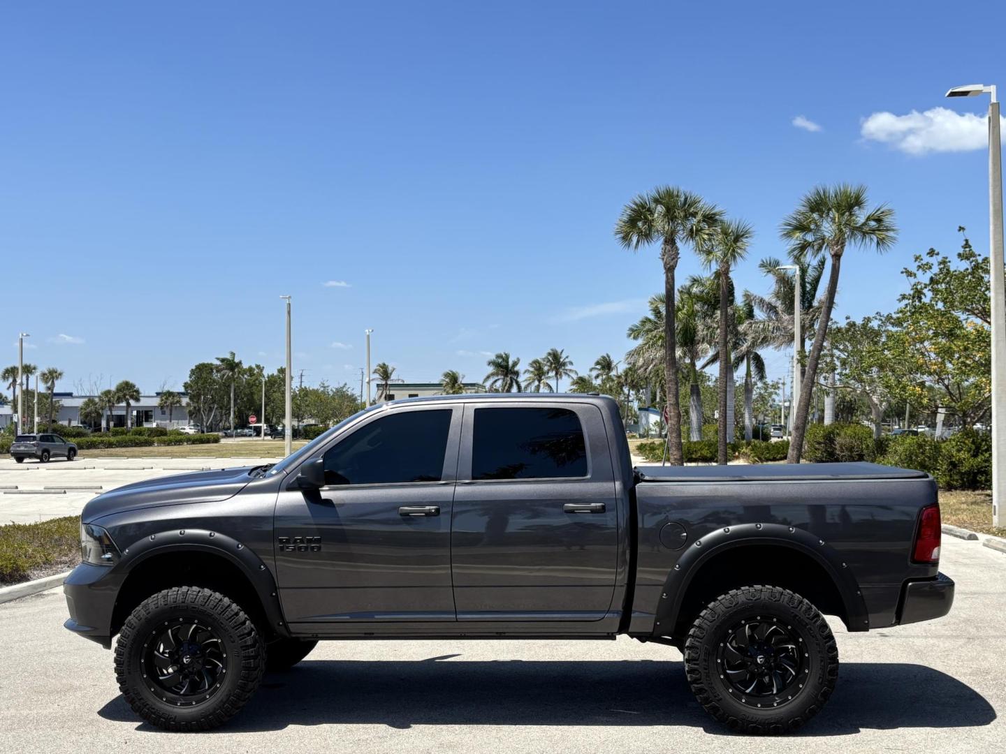 2018 GRAY RAM 1500 Tradesman Crew Cab SWB 2WD (1C6RR6KG2JS) with an 3.6L V6 DOHC 24V FFV engine, 8A transmission, located at 11170 Summerlin Square Dr., Fort Myers Beach, FL, 33931, (239) 999-7777, 26.493546, -81.941628 - 6” Lifted ram 37” Tires Amp power Steps Tinted Leather seats- Touch screen radio w/ 2x10”s under the back seat Wheel lights Underglows 4x2 - 3.6L V6 Automatic Transmission - Photo#6