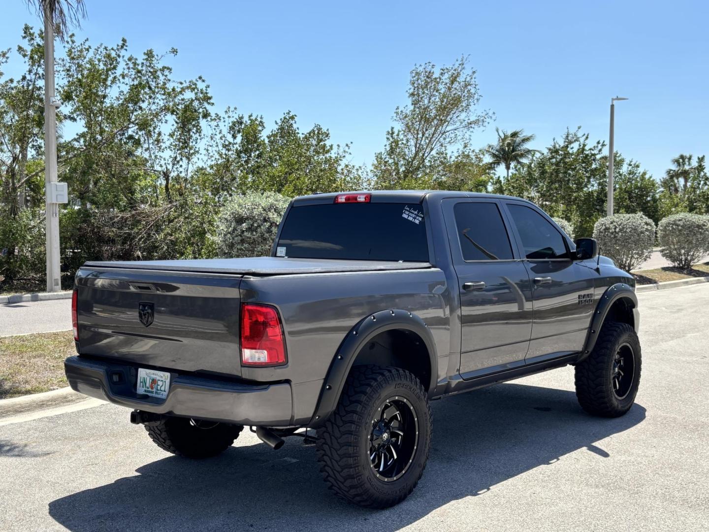 2018 GRAY RAM 1500 Tradesman Crew Cab SWB 2WD (1C6RR6KG2JS) with an 3.6L V6 DOHC 24V FFV engine, 8A transmission, located at 11170 Summerlin Square Dr., Fort Myers Beach, FL, 33931, (239) 999-7777, 26.493546, -81.941628 - 6” Lifted ram 37” Tires Amp power Steps Tinted Leather seats- Touch screen radio w/ 2x10”s under the back seat Wheel lights Underglows 4x2 - 3.6L V6 Automatic Transmission - Photo#7