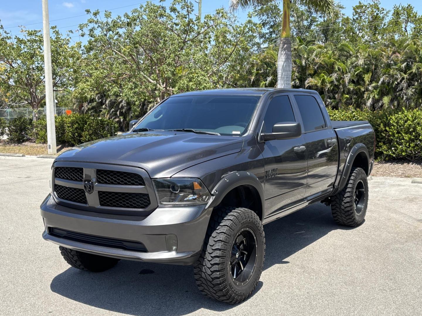 2018 GRAY RAM 1500 Tradesman Crew Cab SWB 2WD (1C6RR6KG2JS) with an 3.6L V6 DOHC 24V FFV engine, 8A transmission, located at 11170 Summerlin Square Dr., Fort Myers Beach, FL, 33931, (239) 999-7777, 26.493546, -81.941628 - 6” Lifted ram 37” Tires Amp power Steps Tinted Leather seats- Touch screen radio w/ 2x10”s under the back seat Wheel lights Underglows 4x2 - 3.6L V6 Automatic Transmission - Photo#0