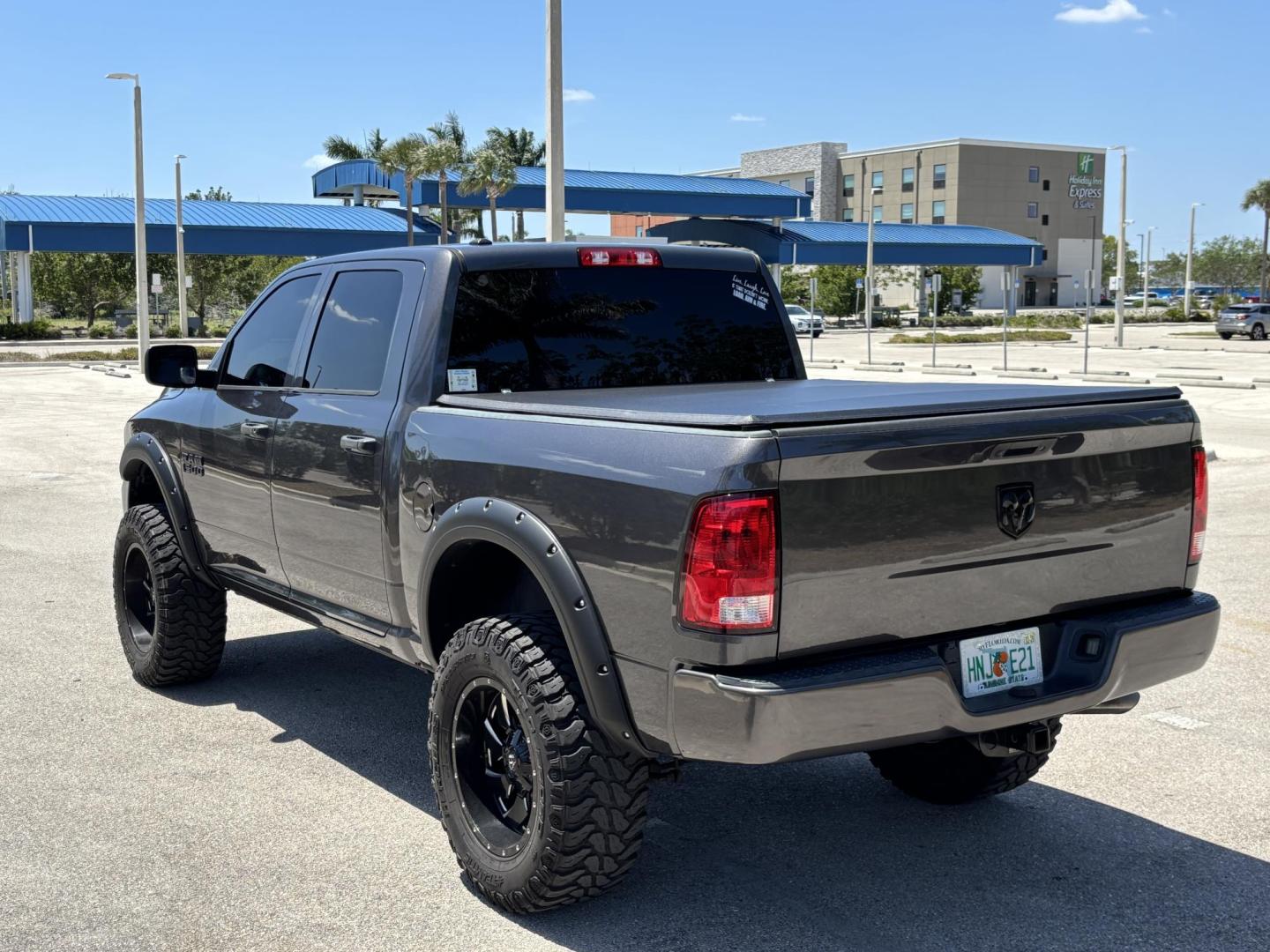 2018 GRAY RAM 1500 Tradesman Crew Cab SWB 2WD (1C6RR6KG2JS) with an 3.6L V6 DOHC 24V FFV engine, 8A transmission, located at 11170 Summerlin Square Dr., Fort Myers Beach, FL, 33931, (239) 999-7777, 26.493546, -81.941628 - 6” Lifted ram 37” Tires Amp power Steps Tinted Leather seats- Touch screen radio w/ 2x10”s under the back seat Wheel lights Underglows 4x2 - 3.6L V6 Automatic Transmission - Photo#4